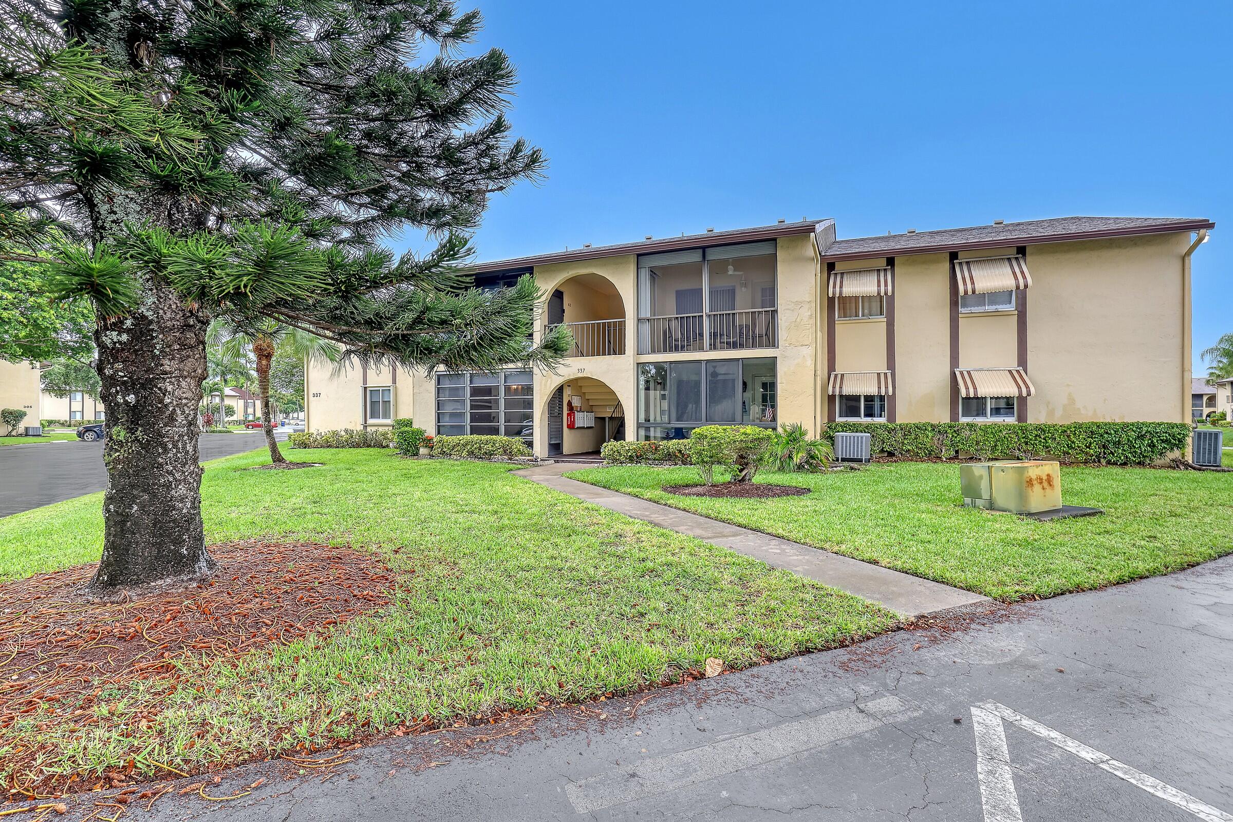 Move right into this well-maintained 1st floor/fully furnished 2-bedroom, 1.5-bath condo in Pine Ridge III, an active 55+ community with affordable monthly fees. Enjoy resort-style amenities including tennis, pickleball, shuffleboard, bocce ball, a clubhouse with library & seasonal social events hosted by the Men's & Women's Clubs. Your assigned parking space is conveniently located just outside the screened patio with ample guest parking & a community car wash area nearby. Ideally located near world-class shopping, golf courses, beaches, cultural attractions, medical facilities, and Donald J. Trump International Airport. All furnishings are included, making this truly move-in ready.