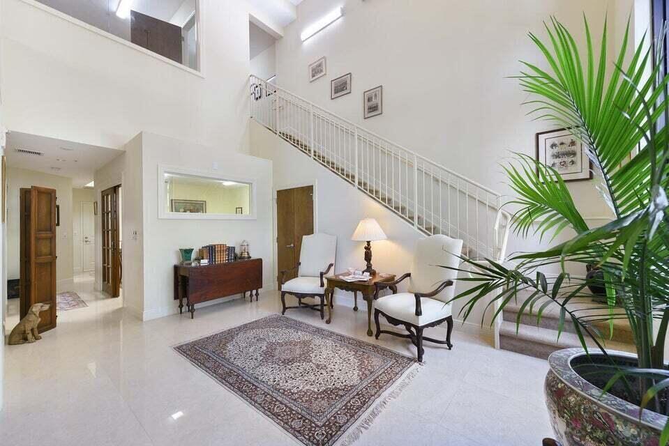 RARE INVESTMENT OPPORTUNITY in Downtown West Palm Beach. Outstanding Live/Work condominium in exciting Two City Plaza. this ground floor unit is in immaculate condition, with both private street and lobby entrances ideal for commercial and/or residential use. The first floor contains a downstairs entry foyer, large waiting room, large conference room, two offices, kitchen, laundry room and half-bath with handicapped access. The second floor loft contains a waiting room, large executive office with views of the downstairs waiting room and street, full bath and a walk-in closet. The unit has independent central heating and cooling and comes with a private underground parking space. Building: built 2008, superbly managed with exceptional staff, 24-hour security, 24-hour full service security ,concierge, pet friendly, free valet parking and metered street parking. Amenities include a spectacular rooftop pool area with summer kitchen, moonlight theatre and ocean views, a state-of-the-art fitness center, steam room, sauna, movie theatre, and club lounge.