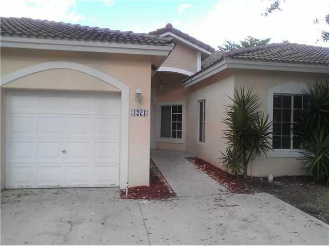 Welcome to this charming all ages, pet friendly, 3-bedroom, 2-bathroom villa in Deerfield Beach, situated in the Olympia & York Residential Plat. This single-story residence offers 1,428 square feet of finished living space, providing comfortable and efficient layout for modern living. The villa includes a convenient 1-car garage for secure vehicle storage. Located in Deerfield Beach, this property presents an excellent opportunity for those seeking a well-proportioned home in an established residential community. Excellent school district. Minutes to the beach, close to all you need. Gated community. English, Espanol, Portugues