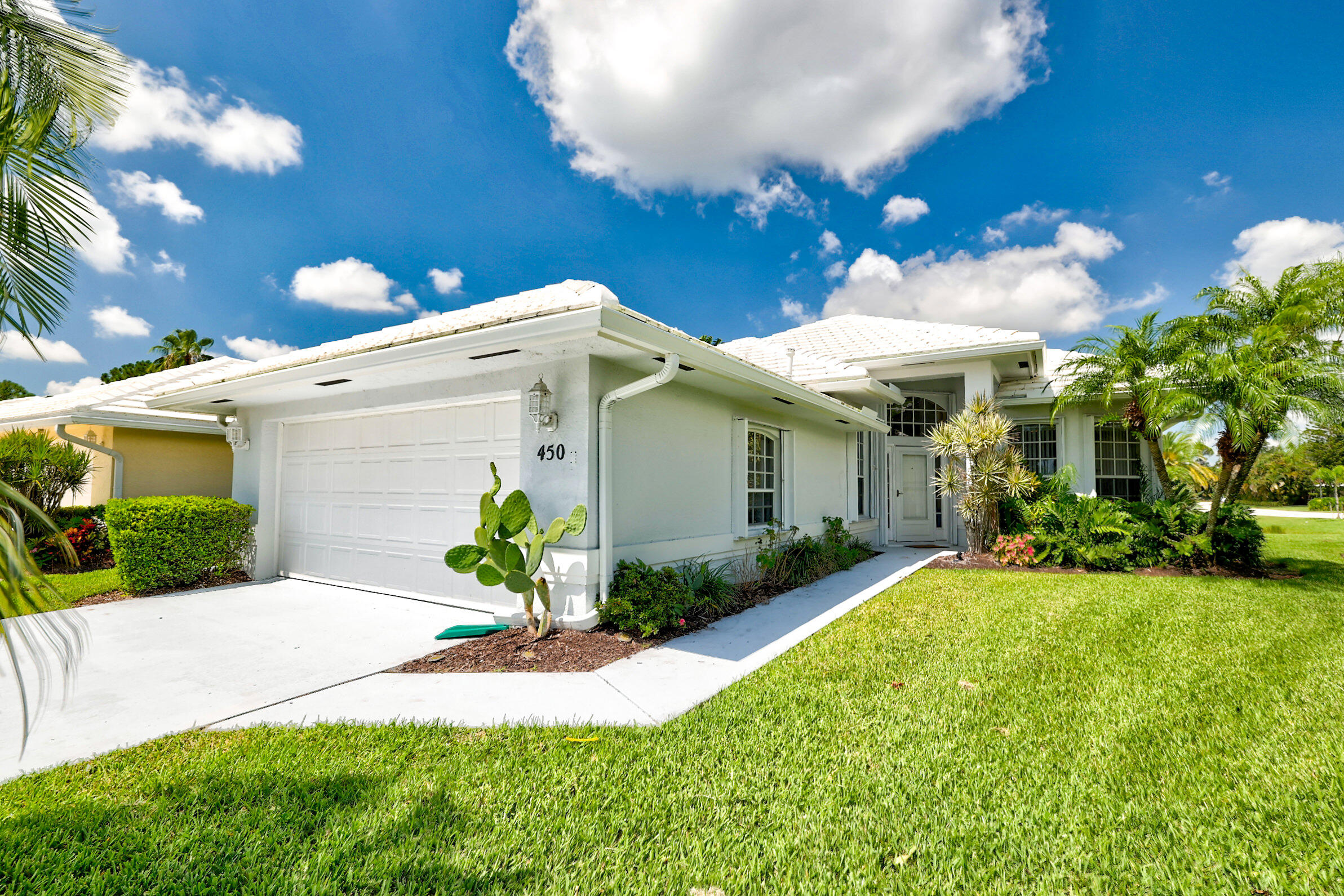 Welcome to this single-story waterfront residence in Port St. Lucie's Fairway Isle community, offering 1,632 square feet of finished living space designed for comfortable everyday living. This two-bedroom, two-bathroom home with a den features a two-car garage for convenient parking and storage. Situated on a pond the property is within Fairway Isle, a small quite community that has access to Country Club Estates memberships. The thoughtful floor plan and practical amenities make this property an excellent choice for buyers looking to establish themselves in this established Port St. Lucie community. St. Lucie West is a well-maintained community known for its scenic lakes and proximity to Clover Park, the spring training home of the New York Mets. The area offers convenient access to shopping plazas, diverse dining options, and local brewpubs, and is located just minutes from regional beaches and boat ramps.