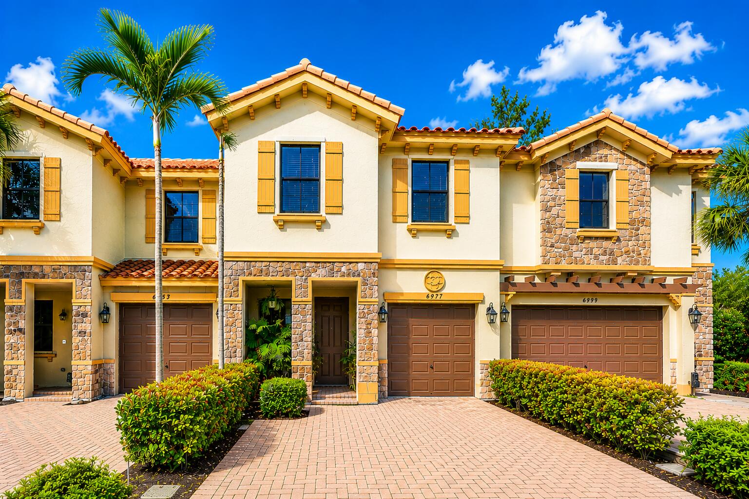 Stunning townhome featuring 3 bedrooms and 3 full bathrooms located in Ashton Parc of Coconut Creek. Buit in 2017, makes this townhome one of the newer built in the area. The home offers 1,594 square feet of finished living space across two stories.  Granite kitchen with dark wood cabinets, beautiful backsplash and a full-size pantry. Open layout design with separate Florida room and living room. Living room can be converted to possible 4th bedroom with ensuite bathroom. Dual sinks in both upstairs bathrooms with a tub in the second bath. Tile throughout the first floor with carpet on the stairs and 2nd floor.  Back patio ready for entertaining. One car garage and room for 2 cars in the driveway. Low HOA fees, great location, near some of the best schools in town. Assume an FHA mortgage of $290k at 2.75% interest.  Monthly payment is $2,500.