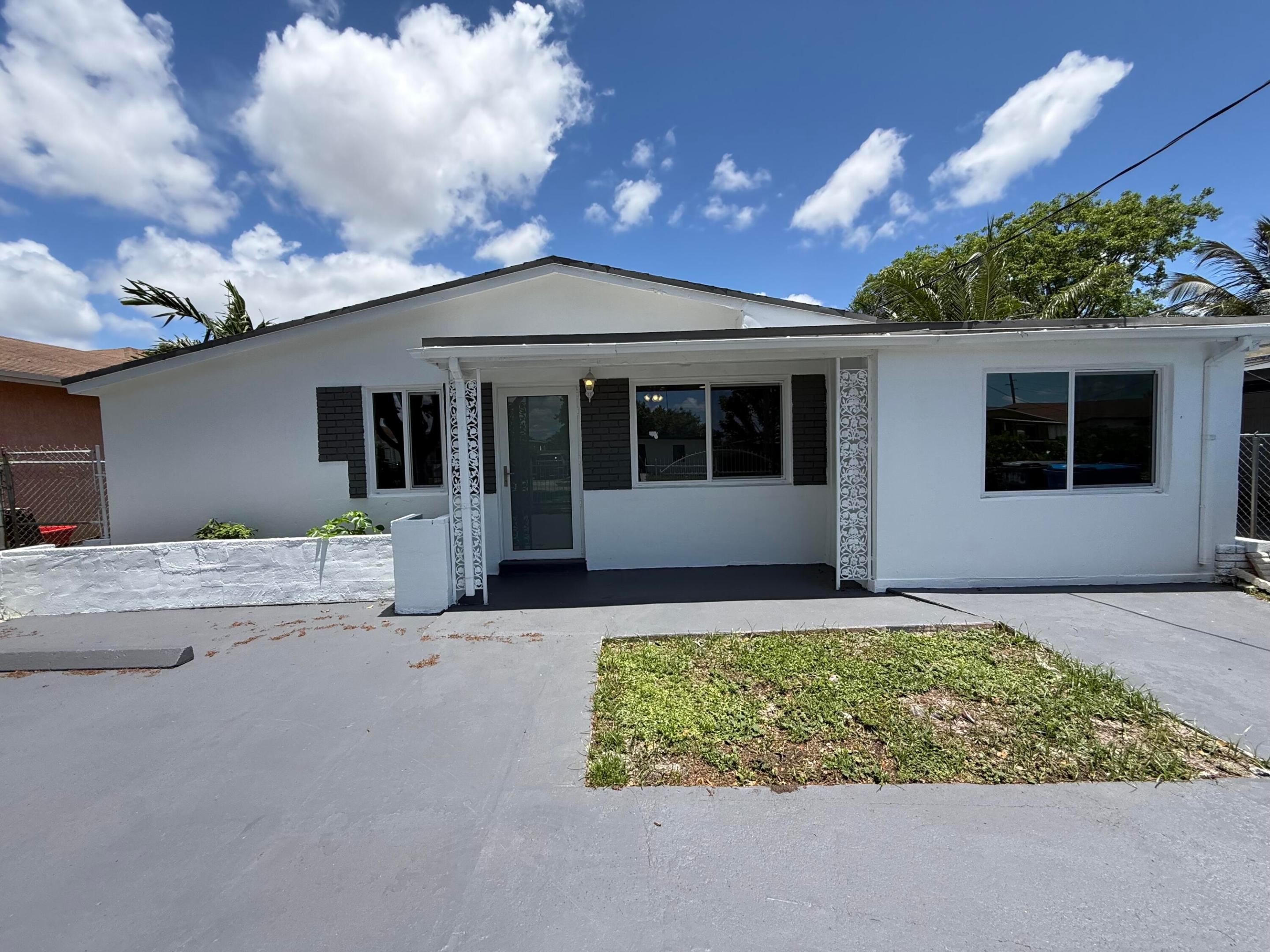Welcome to West Park.  Introducing this beautifully remodeled 4 beds, 2 baths, Ranch boasting a circular driveway with 2 sliding gates!!! Enjoy the hardwood floors, impact windows and doors, central AC, recessed lighting and ceiling fans,  huge laundry room, and room for a pool in your oversized fenced backyard.  This is the one !!! Come and get it. Bring the family to see their new home. Your wife is going to make you buy this one :-)  Close to everything and easy to show. Don't let this one get away.  SELLER GIVING BUYER 3% SELLER CONCESSION TOWARDS BUYERS CLOSING COSTS. Welcome to your new home.