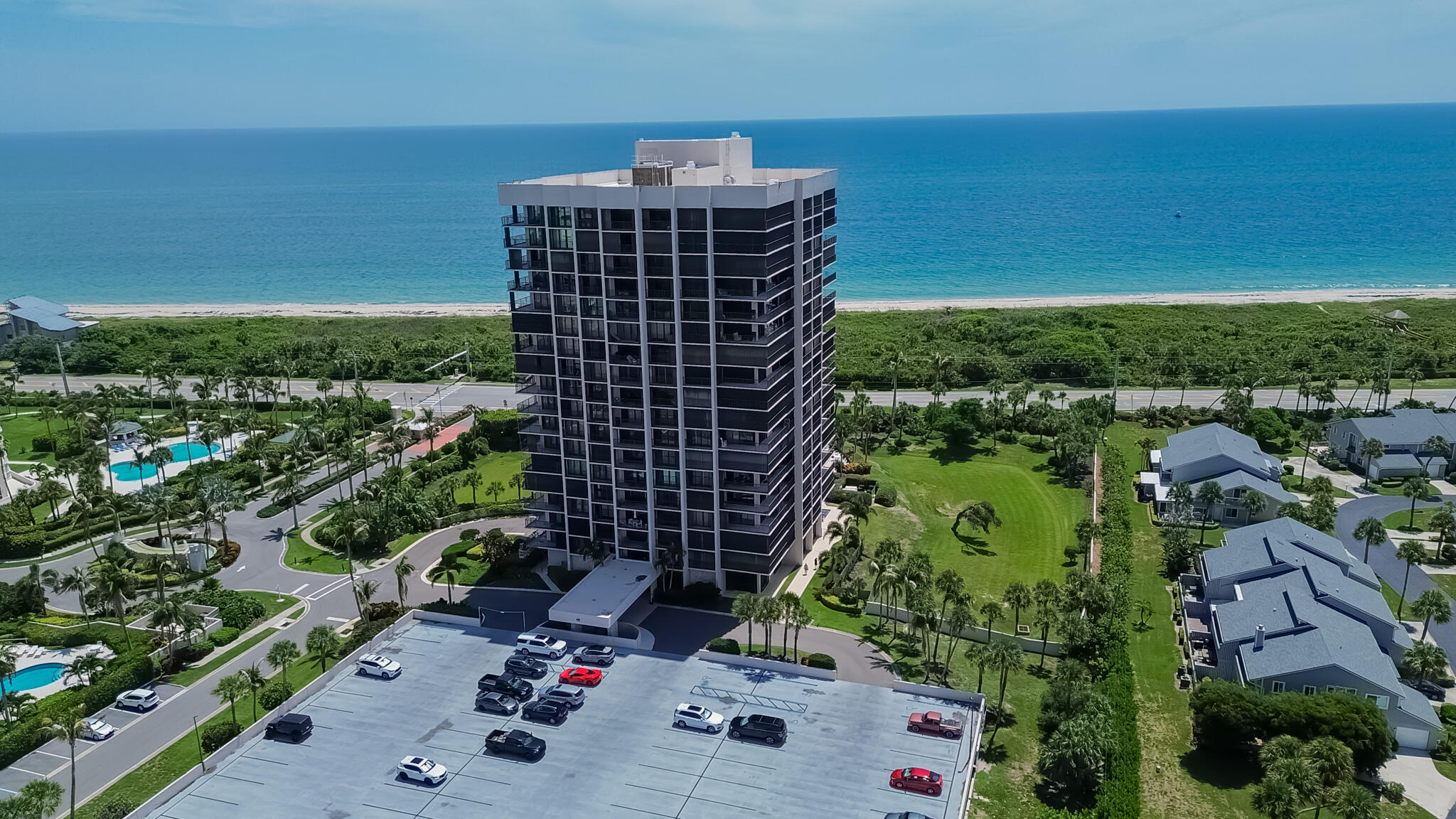 Wake up to breathtaking river and Intracoastal views from this beautifully renovated 2BR/2BA condo in the sought-after Atlantic View Beach Club on North Hutchinson Island. This split floor plan features a spacious great room, tile flooring throughout, granite countertops, wood cabinetry, new stainless steel appliances, fresh paint, and a private laundry room with washer and dryer. The primary suite offers a walk-in closet, oversized vanity, and walk-in shower. Relax on the covered balcony or enjoy peace of mind with accordion hurricane shutters. This gated, oceanfront community features private beach access, pool, hot tub, tennis, pickleball, shuffleboard, fishing dock, kayak launch, secure parking, and HOA dues include cable, internet, water, sewer, and trash. Schedule your showing today!