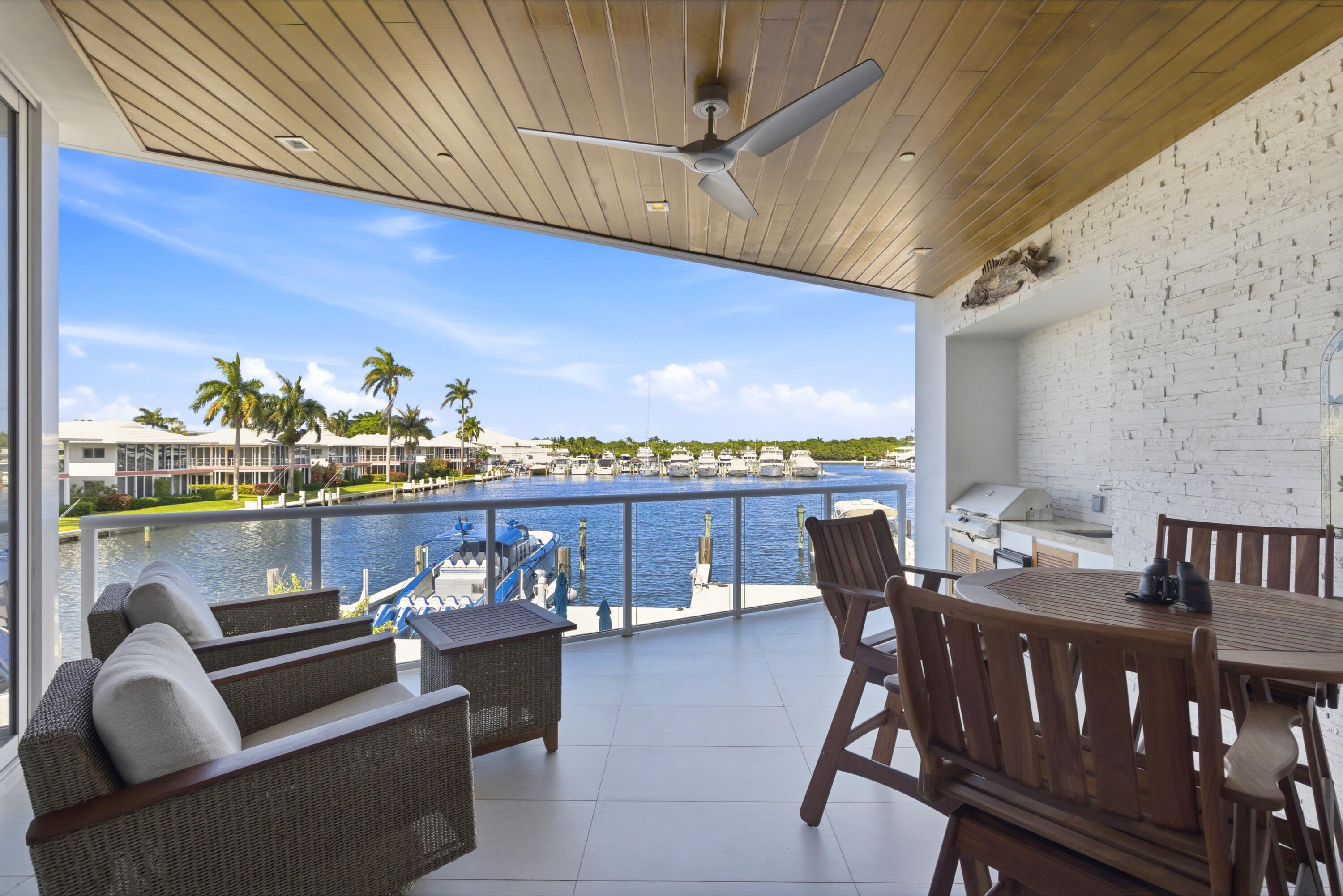 Welcome to Adagio on the Bay, an intimate building offering privacy, security, and quiet—just minutes from the ocean. This 3BR/3.5BA residence offers a boater's lifestyle, with dock available for a vessel up to 50 feet, no fixed bridges and direct ocean access. Enter from your private elevator to a spacious living room with multiple seating areas and water views. The chef's kitchen features Gaggenau appliances, including a gas cook top. Large balcony with bay and intracoastal views and built-in summer kitchen. The primary suite boasts a spa-like bathroom with soaking, large shower and two walk-in closets. Large second bedroom with en-suite bath and walk-in closet. Third bedroom used as den but has full en-suite bath and can easily be used for guests. Utility Room with lots of storage. With only a select number of residences in the building, this home offers a secure, low-density lifestyle rarely found so close to the water. The unit includes 2 assigned parking spaces in the garage along with large storage closet. A must-see for boaters, entertainers, and buyers seeking privacy without compromise.
