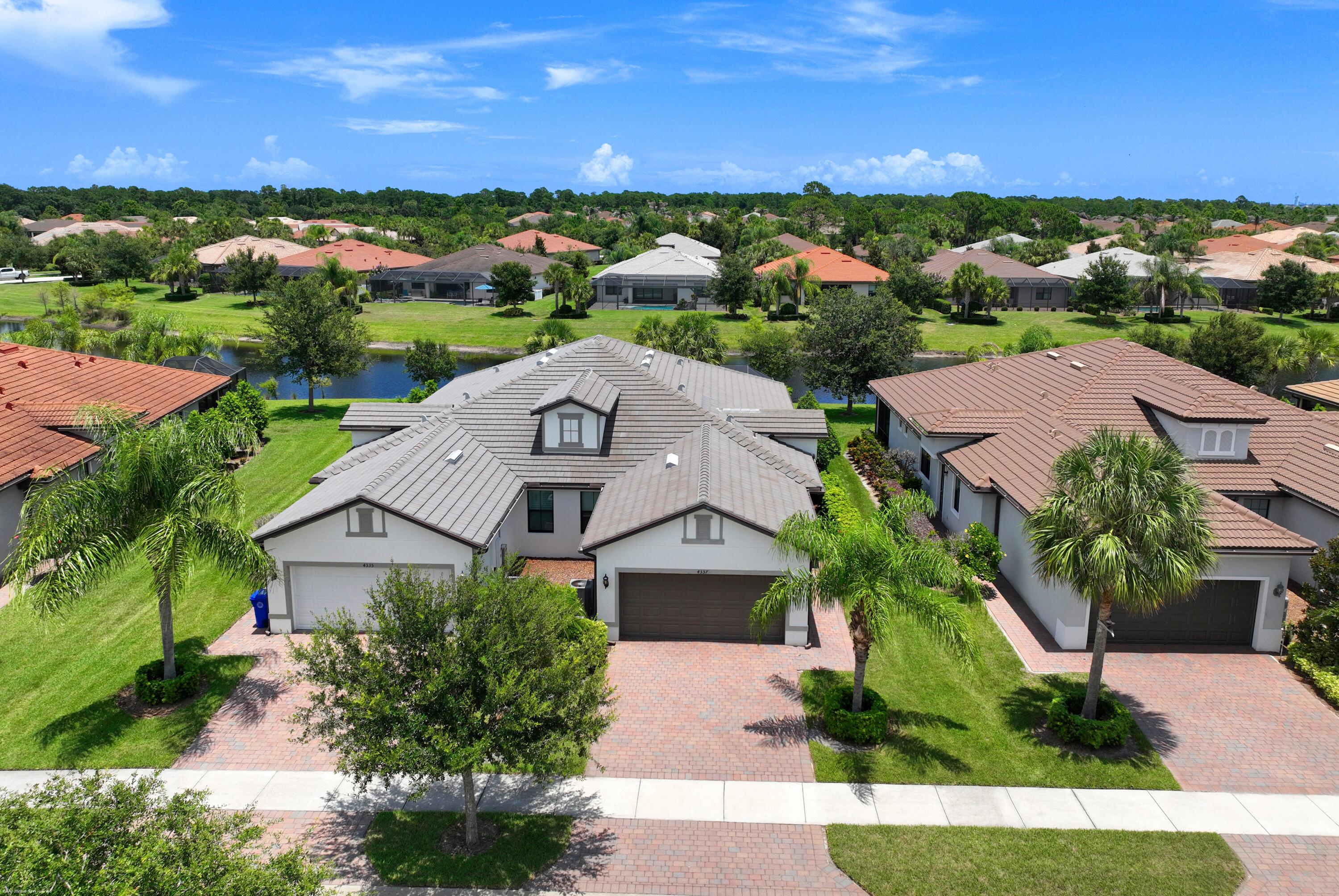 Serene lakefront 3BR/2BA home in the Lakes at Waterway Village, mins from Vero's beachside dining & shopping. This immaculate block & tile roof home features impact glass, upgraded appliances & tile throughout. Enjoy ultimate comfort with a soundproofed primary suite wall, insulated auto garage & attic storage. Relax on the extended, screened lanai with a built-in privacy wall—perfect for lakefront sunsets. Low HOA fees include gated security, lawn care, cable & resort amenities: pool, fitness center, tennis & pickleball. Call Vero Beach Home!
