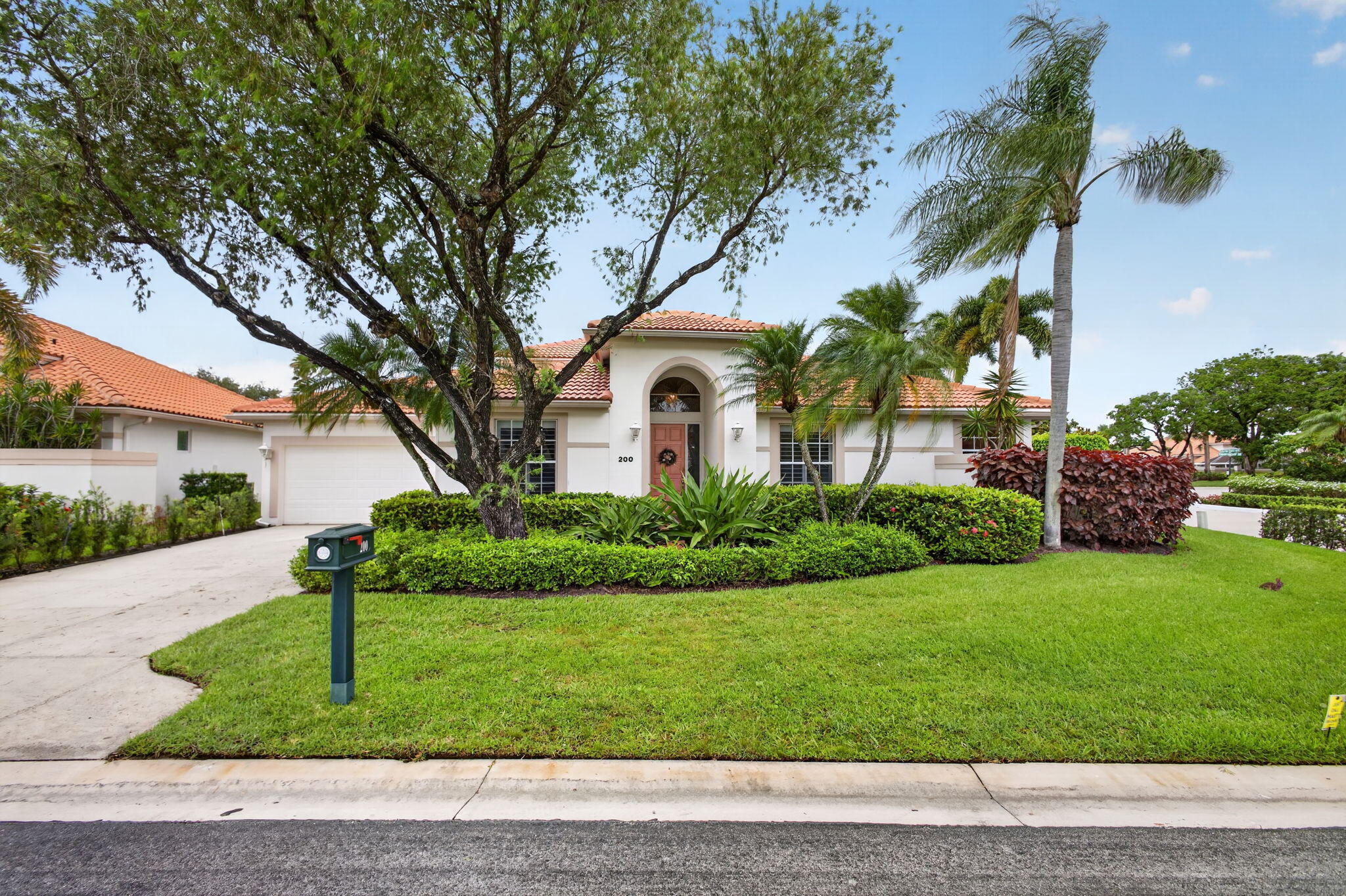 Eagleton Estates is a private 24 hour manned gate community within the prestigious community of PGA National. Beautifully maintained light and bright home with desirable one story split bedroom floor plan. This home features 3 bedrooms all with full en suite baths, 2 car garage, natural gas, large heated pool with beautifully landscaped backyard, expansive screen-enclosed patio. Roof replaced in 2009, Ac replaced in 2023 all ducts replaced in 2025. PGA National membership is available but not required. motivated seller!!! Bring all offers. Home is turnkey.