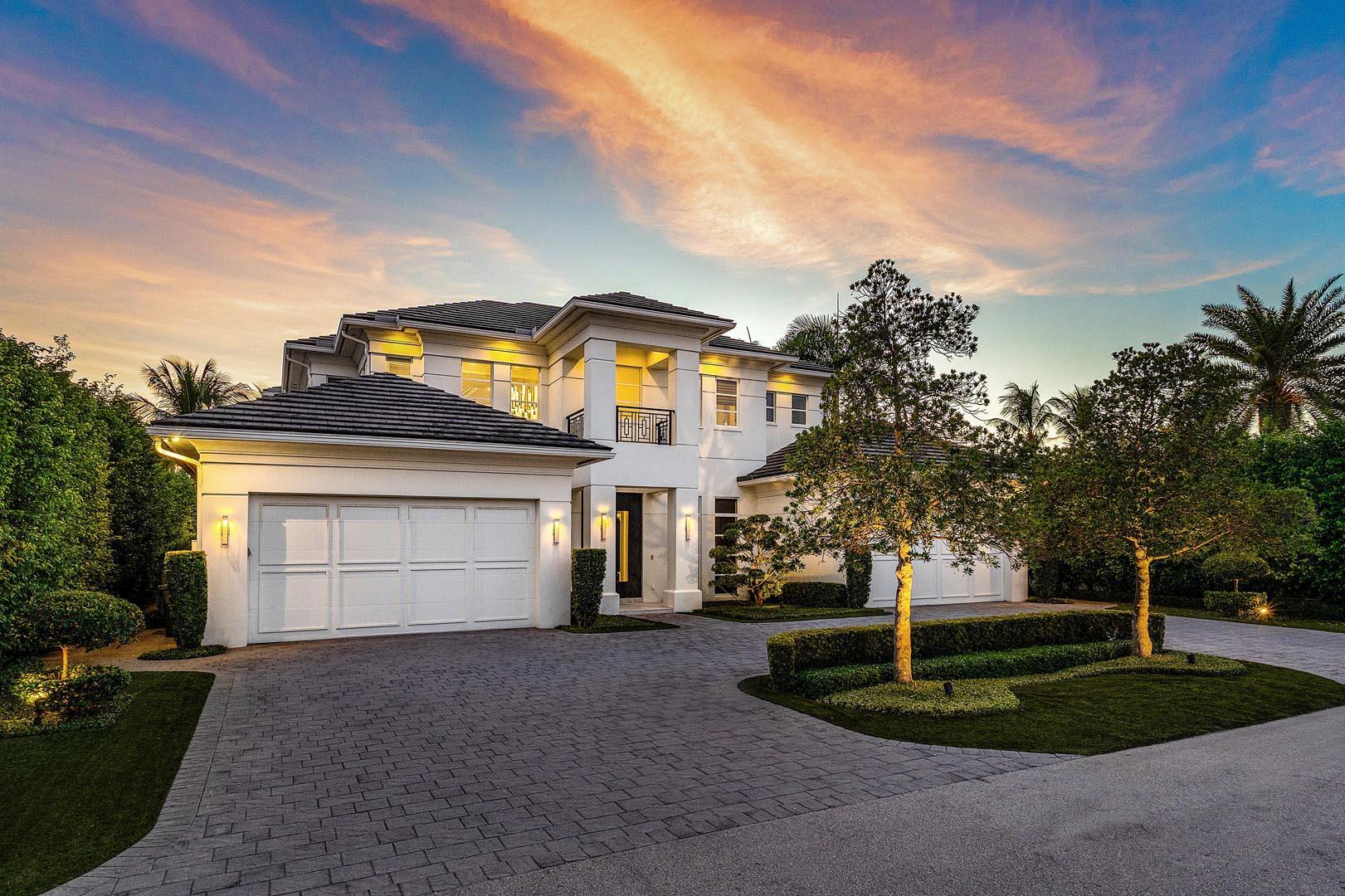 Custom built in 2017 by SRD Building Corp and styled by award-winning P&H Interiors, this 5,035-square-foot estate offers an elevated lifestyle within Royal Palm Yacht & Country Club. Designed for effortless living, the residence features four-bedroom suites, four full and one half bathroom, and a layout that balances comfort with everyday elegance.

The gourmet kitchen, equipped with premium appliances and a welcoming eat-in dining space, flows seamlessly into the great room. A private study with custom wood built-ins provides a polished retreat for work or quiet focus. The first-floor primary suite offers a spa-like escape with generous His and Her closets.

Outdoors, the property is a private sanctuary. A custom heated pool surrounded by lush landscaping sets the stage for relaxation, while the covered patio, built-in BBQ, and full bar invite memorable gatherings year-round.

With Crestron smart home technology, a whole-house generator, elevator, natural gas, and premium turf yard, the home is as functional as it is inviting. The 4-car garage with dual lifts expands to a 6-car capacity, completing this move-in-ready offering.

Square footages shown are from the Palm Beach County Tax Records.
