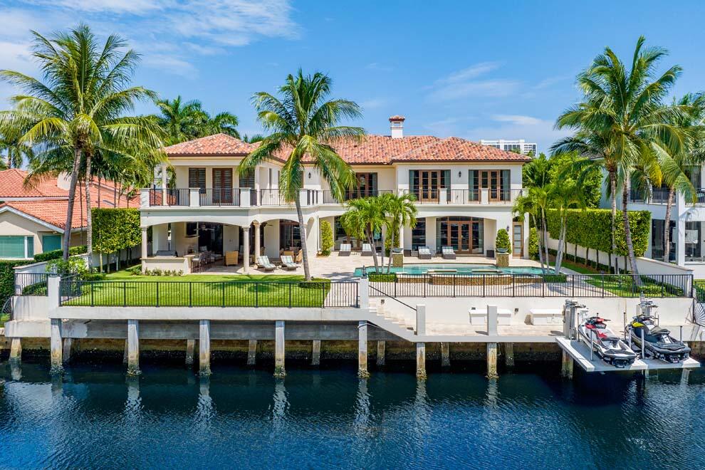 Located in one of the most coveted waterfront sections of Royal Palm Yacht & Country Club, this five-bedroom custom residence built by SRD Building Corp is in pristine condition, providing a like-new feel. This beautiful home is offered fully furnished & turnkey with luxurious furnishings throughout. With over 10,000 total sq ft, the estate features an open floor plan; 4-bay garage; chef's kitchen; club room with theater; dedicated study; integrated smart-home Crestron system, Vantage lighting; 70kw generator; large elevator; spacious primary suite with morning bar, dual baths & closets, impact doors & windows, full of natural light.  The resort-style backyard features an expansive covered loggia; pool & spa; summer kitchen; large turf yard, 100' of waterfrontage and dock. FEATURES
- Builder SRD Building Corp.
- Architect John D Conway
- Interior designer P&H Interiors
- 5 bedroom
- 6 Full bathrooms 2 Powder bathrooms
- 10,000+ total square feet
- Summer kitchen and large covered logia
- 4-Car garage
- 4-Zone AC
- Dual Split AC 2013 (South Garage / Equipment Room)
- Wine Cellar chiller
- Heated salt-chlorination pool and spa
- 70KW Generac generator
- Natural Gas
- 8 Cameras 
- Vantage Lighting
- Automatic shades in:
Living / Kitchen / Breakfast 
Club Room 
West side bedrooms
Upstairs Bonus Room 
- Crestron Controller
- Crestron Touch Panels in:
Kitchen
Office 
Bedrooms
               His/Her Bathrooms
- Crestron Remotes in:
Living Room
Club Room 
Master  
Upstairs Bonus Room 
- Kaleidescape in: 
Living Room
Club Room
Master
Upstairs Bonus Room 
- Crestron SWAMP multi room audio 
Family Room / Kitchen
Formal Living 
Dining 
Office
Bedrooms
His / Her Bathrooms
Also covered patios, decks & pool  
South Garage
- Crestron DM fiber optic video in: 
Living Room
Club Room 
Master 
Also plays TV through his/her bath touch panels
Upstairs Bonus Room