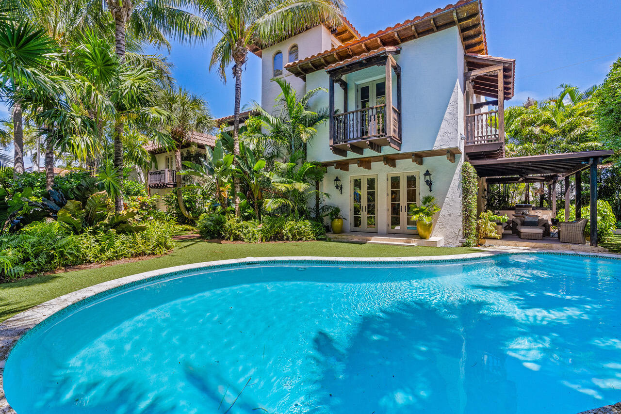 One of the most romantic and gracious properties in El Cid in West Palm Beach, ''Casa Mia'' is now being offered for special purchase. Cleverly built over the carriage house of the ''Flagler Estate'' using salvaged architectural features from historic estates, this 3 bedroom, 3.5 bath pool home will charm you with its special ambiance. Casa Mia will transport you to a private spot in Tuscany. Cypress trees line the entrance to the gracious foyer. The large formal living and dining area and the downstairs guest suite enjoy views of the beautiful hidden koi pond with meditation terrace. The well appointed gourmet kitchen leads to a lovely patio with summer kitchen. The second floor master suite encompasses the entire east expanse and has stunning views of the Intracoastal waterway. A third floor den opens to a large sun deck that is large enough to have dining seating and an outdoor kitchen, for your further enjoyment. Other features include a garage with Chicago brick parking court and a double gated entrance. A truly private and spell-binding estate!