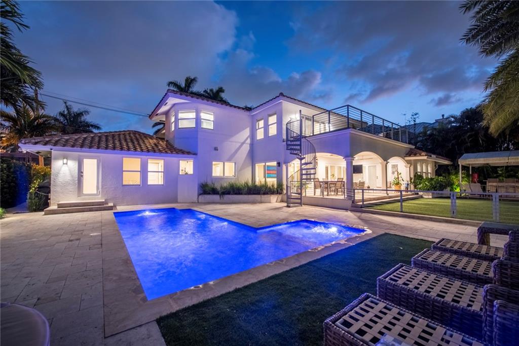 PRIME LAS OLAS LOCATION IN GUARDED ENCLAVE OF SEVEN ISLES. WALK TO BEACH OR DOWNTOWN/LAS OLAS! RENOVATED TRANSITIONAL ESTATE HOME! PRESTIGIOUSAS! 1/3 ACRE PRIVATE OASIS! 100' NO FIXED BRIDGE DOCKAGE! BRIGHT AND OPEN FLOOR PLAN! LARGE OPEN KITCHEN FEATURES DOUBLE OVEN, ISLAND WITH COOKTOP AND HOOD.  AMAZING BACKYARD WITH OUTDOOR SUMMER KITCHEN AND TROPICAL POOL AND A REAL YARD WITH COVERED LOGIA FOR GRAND SOUTH FLORIDA LIVING!  LANDSCAPED FOR PRIVACY!  NEW 100FT DOCK/SEAWALL WITH A 12,000 POUND LIFT!  WHOLE HOUSE GENERATOR AND WIND RATED WINDOWS AND DOORS!  THE PROPERTY IS MORE SPECTACULAR IN PERSON! COME TOUR THIS STUNNING RESIDENCE OF DISTINCTION TODAY AND BE BLOWN AWAY!