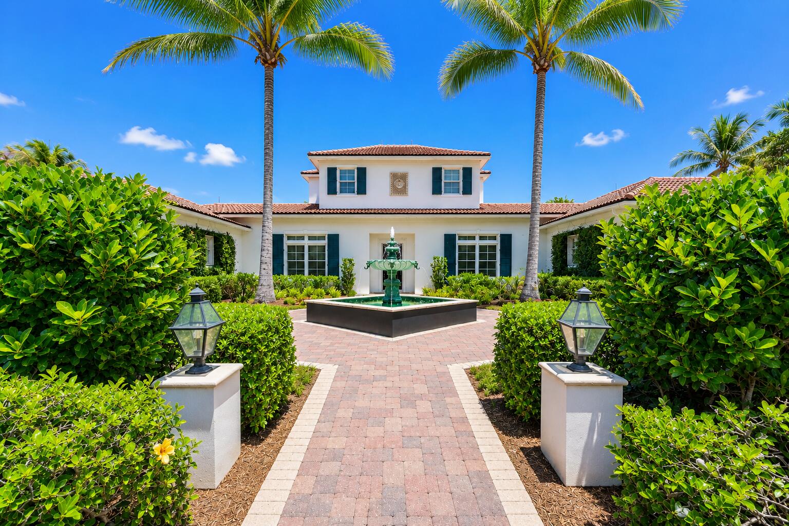 Perfectly positioned along the desirable North Lake in Loblolly Pines, this exceptional waterfront estate captures sweeping eastern lake views, refreshing ocean breezes, and the serene beauty of one of Hobe Sound's most sought-after private club communities. Built in 2005 and encompassing 4,733 square feet, this spacious two-story residence has been thoughtfully updated with fresh interior paint and renovated bathrooms, creating a bright, sophisticated coastal aesthetic throughout. Offered fully furnished, the home presents a rare turnkey opportunity for immediate enjoyment. Designed with both elegant entertaining and comfortable everyday living in mind, the main residence features four spacious bedrooms, a private den, four full baths, and a half bath.  High ceilings, abundant natural light, and expansive windows frame picturesque water views from many of the home's principal living spaces, creating an effortless connection between the indoors and the spectacular surroundings. The spacious primary suite is conveniently located on the main level, providing a peaceful retreat with privacy and easy access to the outdoor living areas. Upstairs, family and guests will appreciate a private haven featuring two generously sized bedroom suites, two full baths, and an expansive gathering room, ideal as a media room, game room, or additional family lounge. At the heart of the home, the living and entertaining spaces flow seamlessly onto a screened lanai overlooking the sparkling pool and tranquil lake beyond. Whether hosting sunset cocktails, enjoying al fresco dining, or relaxing with a morning cup of coffee as the sun rises over the water, the outdoor setting offers a lifestyle that is both peaceful and unforgettable. A detached one-bedroom, one-bath guest house provides luxurious accommodations for family and friends, offering privacy and comfort while maintaining a close connection to the main residence. Surrounded by lush tropical landscaping and framed by breathtaking waterfront vistas, this remarkable estate embodies the relaxed elegance that defines life at Loblolly. Combining timeless architecture, modern updates, exceptional privacy, and a coveted lakefront setting, presents a rare opportunity to own a truly distinguished home in one of South Florida's premier private golf communities.