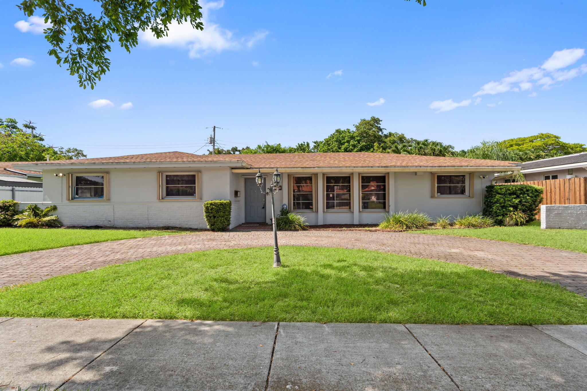 Welcome to this spacious single-story residence in Highland Lakes Miami, FL, offering 2,287 square feet of finished living space. This five-bedroom, three-bathroom home provides ample room for comfortable living and versatile use of space. The one-story layout creates an open, accessible floor plan ideal for convenient daily living. Located in the established Highland Lakes  community, this property presents an excellent opportunity for those seeking comfortable living in Miami that's near to everything yet tranquil in location . Ample room in the back yard for putting in that garden you always wanted and  with a large enclosed porch. Property has its own generator and the master bathroom has a walk in tub.This property oozes potential , book a showing as soon as you can.