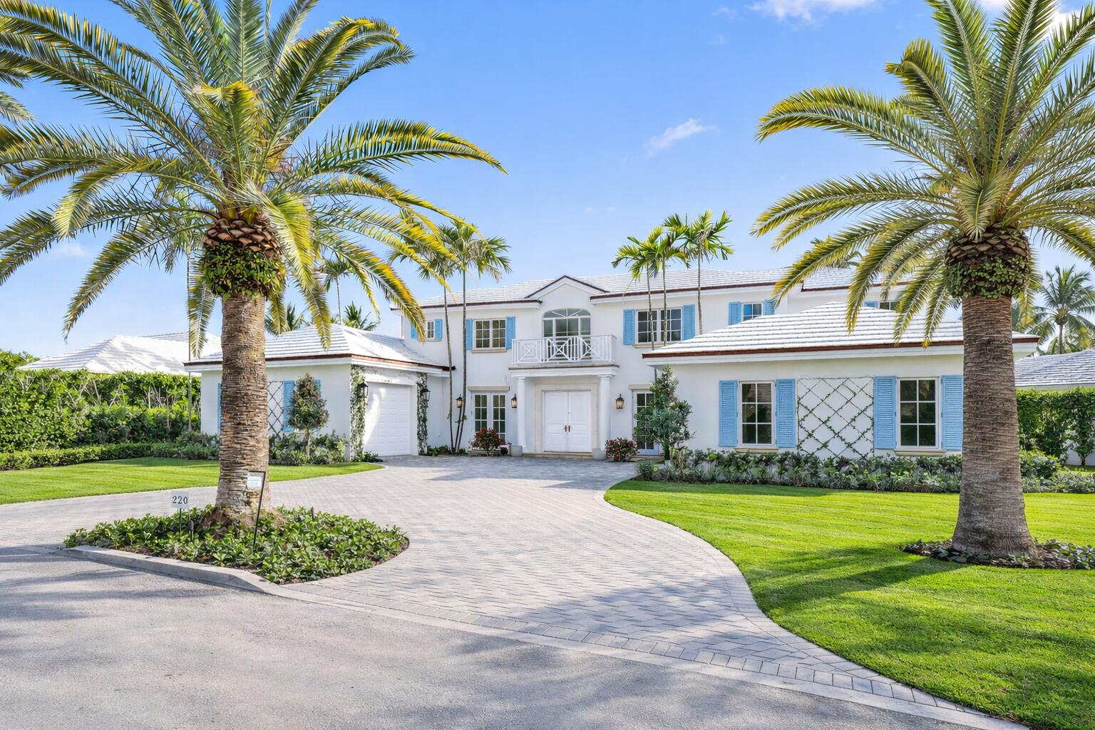 NEWLY RENOVATED with BEACH ACCESS! Positioned in Palm Beach's coveted North End, this exceptional 4-bedroom, 5.1-bath residence with a dedicated office spans approximately 5,000 total square feet. Thoughtfully redesigned for effortless, elegant living. A brand-new chef's kitchen, finished with marble countertops, hardwood flooring, and Sub-Zero and Wolf appliances, flows seamlessly into the family room, overlooking a lush tropical backyard. Designed for true indoor/outdoor living, the enhanced outdoor spaces include a covered loggia, a heated pool and spa, an outdoor shower, and a convenient cabana bath. The interior also features a newly added wet bar and a beautifully reconfigured primary suite. The first-floor primary retreat offers a serene view of the backyard, dual walk-in closets, and a luxurious spa-style bath with a freestanding soaking tub, expansive walk-in shower, and dual vanities. Upstairs, three en-suite bedrooms, a flex room, with access to a generous shared balcony. Two separate attached garages complete this rare North End offering, just moments from the beach and the best of Palm Beach living.