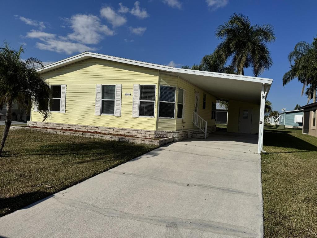 THE 1st 6 MONTHS OF LOT RENT ARE FREE!! Lovely park-owned home in the desirable Spanish Lakes Fairways community! With a new roof and low lot rent of $599/month, this home offers exceptional value for the next buyer. Inside, enjoy modern cabinets & flooring, creating a fresh and updated living space. Relax in the screened porch or take advantage of the home's convenient location close to the community entrance and clubhouse. Perfect move-in-ready opportunity in a well-maintained, vibrant neighborhood! Enjoy resort-style living Spanish Lakes Fairways! Amenities include free golf, clubhouse with pool, fitness center, library, & hobby rooms, plus tennis, pickleball, shuffleboard, bocce, & regular social events. Trash & lawn maintenance included in lot rent. Storage shed ready for your tools! Includes all appliances.