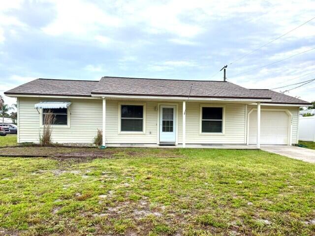 No HOA!! Clean as a Whistle!  3 bedroom, 2 bathroom, 1 car garage home on corner lot!  Roof 2003, AC 06/2023, Water Heater 10/2022.  Large screened patio, covered front porch, split bedroom plan, vaulted ceilings in living/dining area, wood cabinets in the kitchen, and tile throughout. Exterior features-Full House Generator & Gas Tanks 2013, extra refrig in garage, sprinkler system, shed, panel/awning hurricane protection.