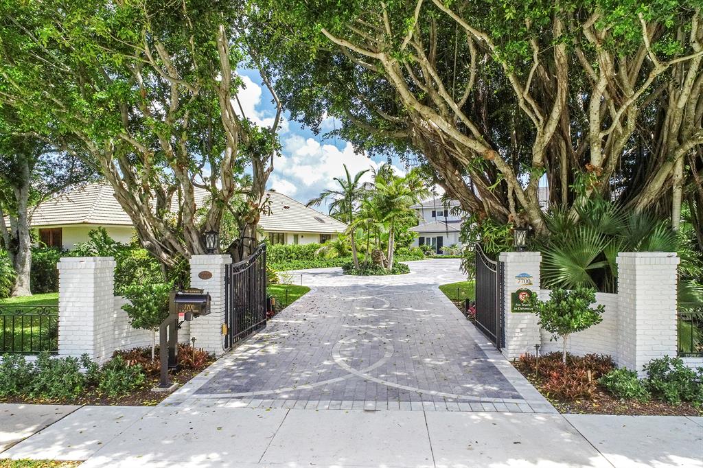 The views of an uninhabited bird sanctuary island from every room make this direct Intracoastal waterfront property unique and highly sought after. The immaculate four bedroom, four and one half bath estate home has been meticulously renovated with no expense spared. This beautiful home boasts a gourmet kitchen, 260 bottle wine room, lavish master suite, fabulous living room with soaring ceilings and vast water views, massive 4 car garage and a resort style pool and backyard. Sitting behind electronic security gates and accessed by a custom paved circle drive/auto courtyard, your guests will be awestruck. As the sun goes down and the golden hour takes over, this incredible home becomes even more magical.