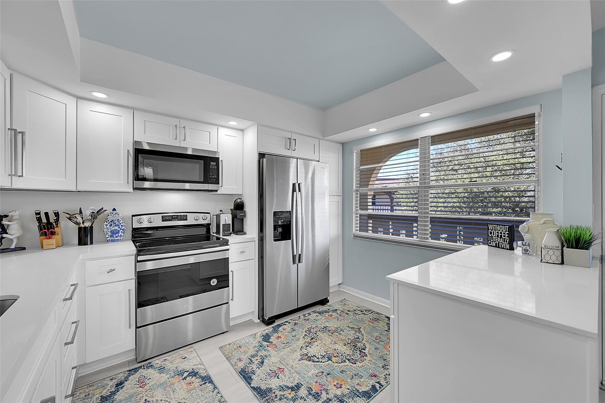 Stunning 2-Bedroom/2-Bathroom Remodeled Condo with Panoramic Golf & Lake Views!. Enjoy panoramic golf/lake views from this beautifully renovated condo, located in the nominated Best Building in Portofino. This move-in-ready residence features a newer renovated kitchen with new cabinets and newer appliances, perfect for both everyday living & entertaining. Both bathrooms have been tastefully renovated with new vanities and modern showers, offering a spa-like feel. Elegant porcelain flooring flows throughout the entire unit, enhancing the bright and open layout. Additional highlights include a new A/C and water heater (2021), New elevator in the building. No assessments for added peace of mind. A truly exceptional home offering style, comfort, and gorgeous views—a must-see!. OCCUP 55+ OCCUPIED BY OWNER-KNOCK FIRST