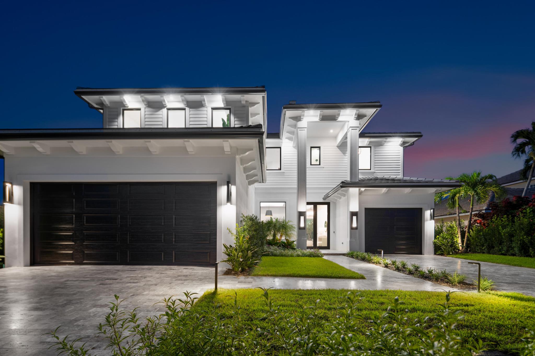 Waterfront luxury meets modern design in this fully furnished new construction masterpiece. This 5-bedroom + office, 4.1-bathroom CBS home also includes a versatile bonus room, perfect for a media space, home gym, or game room and offers 6,742 total square feet with 4,725 under air. Situated on a 75 x 132 (.23 acre) lot with 75 feet of water frontage on a deep canal, this property provides direct ocean access with no fixed bridges and is just 150 yards from the Intracoastal. A brand-new seawall and 65-foot composite dock, stubbed with water and electric; make this a boater's dream. Step inside to discover elevated finishes throughout, from the grand entry with double impact-glass doors and glass-railed staircase, to the gourmet kitchen outfitted with top-of-the-line appliances: 48" Wolf gas range with griddle, SubZero 60" fridge/freezer, dual Cove dishwashers, 24" wine cooler, and a walk-in hidden pantry. Custom cabinetry in white shaker and oak, paired with a Cristallo waterfall island, make this kitchen as functional as it is stunning.
Designed for entertaining, the open layout includes a spacious great room, family room, and bonus roomall flowing seamlessly to the outdoor living area. Floor-to-ceiling sliders flood the space with natural light and frame breathtaking water views. The heated saltwater infinity pool measuring 48 x 15, an 8x8 spa, and an 8x8 sun deck. Surrounded by elegant marble pavers and flanked by twin gas fire bowls, the outdoor living area also includes a large covered veranda with a cabana bath and sets the stage for unforgettable gatherings.
Upstairs, the primary suite is a private retreat with oversized his-and-her walk-in closets and a spa-like bathroom featuring a dual steam shower, soaking tub, Taj Mahal countertops, and a built-in water purification system. An additional ensuite bedroom and an office both open to a large deck overlooking the water, while a third bedroom shares a bath with the bonus room.
Additional upgrades include Phillip Jeffries wall coverings, custom built-ins with an 85" LG TV, high-impact ES hurricane-rated windows and doors, an elevator, dual laundry rooms, a large wet bar with ice maker and wine cooler, and a 500-gallon propane tank. The 3.5-car garage with 15' ceilings is lift-ready and plumbed for an ice machine. The home is generator-ready and smart-home wired, offering both comfort and peace of mind. This is a rare opportunity to own a move-in-ready waterfront retreat built with the highest standards of craftsmanship.
The Village of North Palm Beach is becoming one of the most sought-after communities in Northern Palm Beach County. It is a coastal community with easy access to both the Palm Beach and the Jupiter inlets for some of the best fishing in the world. Combined with easy access to Palm Beach International Airport, some of the best beaches and a wide range of dining establishments in the area, the village is becoming one of the top communities in Northern Palm Beach County. The Village is also home of the newly renovated North Palm Beach Country Club, featuring an Olympic swimming pool, splash pad, picnic area, an on-deck tiki hut, 200 seat banquet room, 100 seat The Grill and The Clubhouse restaurant, A Jack NicklausSignature Golf Course, and a full featured Tennis Facility with Har-Tru courts. It is open to the public and village residents.The village was recently designated as a golf cart friendly community.