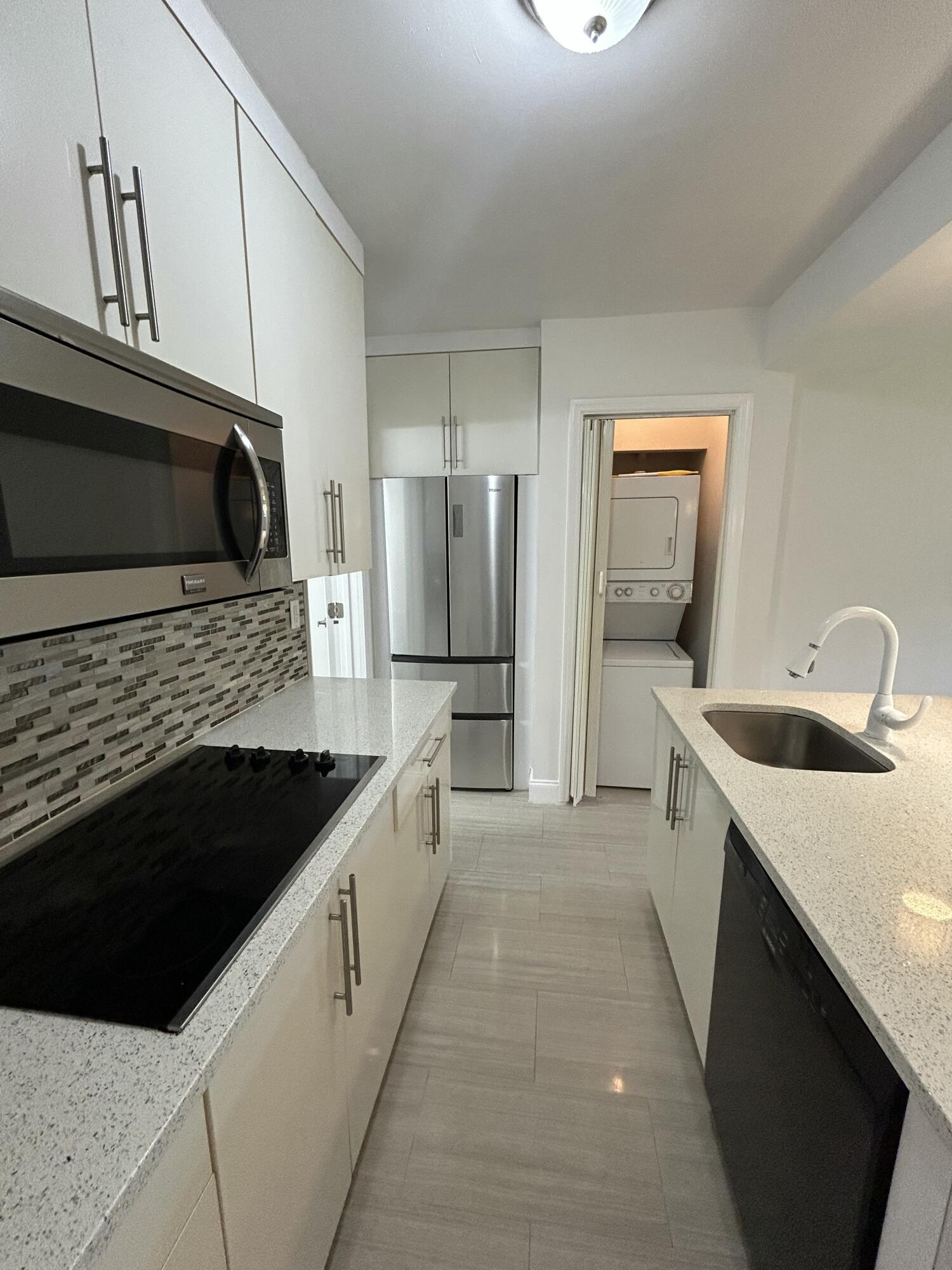 Now available for rent— a bright and updated 2-bedroom, 2-bath unit in Victoria Park. This first-floor home has a clean, modern feel with porcelain tile throughout, impact windows and doors, mini-split A/C, and plenty of natural light. The kitchen features white cabinets with quartz countertops, and both bathrooms have been beautifully redone. You'll also have the convenience of your own washer and dryer, one assigned parking spot, and the option to bring your pet. The location couldn't be better. Close to shopping, restaurants, parks, and just a quick drive to the beach, Las Olas, and Downtown Fort Lauderdale.