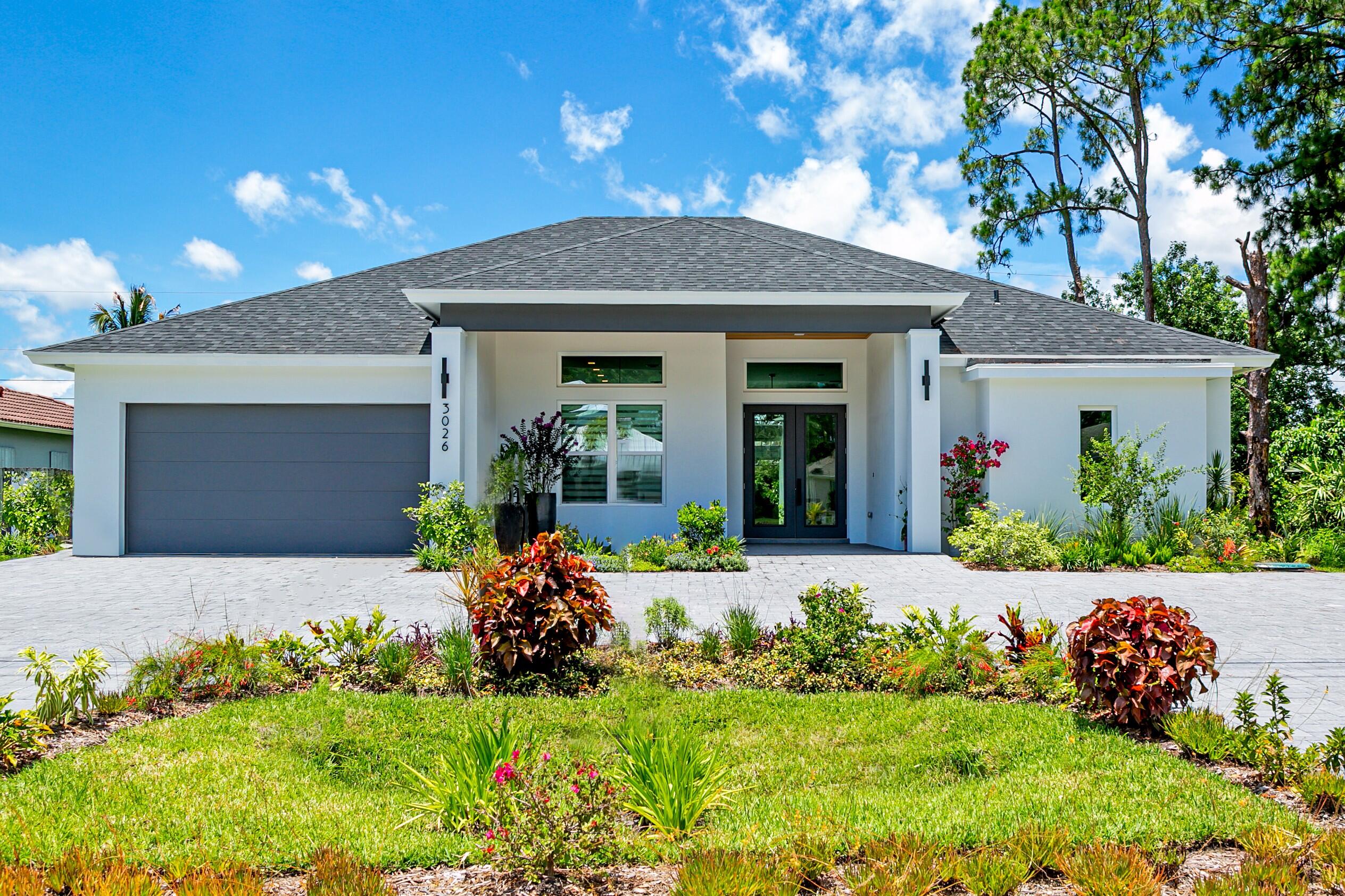 Welcome to your dream home!  Discover the perfect blend of luxury, comfort, and craftsmanship in this stunning 4-bedroom, 3-bathroom model home. This 3,201 sq ft residence showcases elegant tile flooring, a gourmet kitchen, and energy-efficient systems—all designed with your lifestyle in mind. Build this beautiful home on your lot in Port St Lucie for $630,000 or any location you choose for your new dream home. (Please note that prices may vary depending on licensing and permits in different Florida locations.) Crafted with meticulous attention to detail, this home exemplifies the builder's dedication to quality and innovation. Whether you're a first-time buyer or looking to upgrade, this property offers the space, style, and sophistication you deserve. Key Features & Upgrades. Modern Architecture with high-end finishes and custom design. Gourmet Kitchen featuring: Stainless steel appliances: Microwave, Range/Oven, Refrigerator, Garbage Disposal. Granite countertops and custom cabinetry. Spacious Layout with open concept living and dining areas. Tile Flooring throughout for durability and elegance. Attached Garage with over sizes driveway that will fit 3 cars side by side. Luxury Bathrooms with contemporary fixtures. Energy-Efficient Systems: Central air conditioning and forced-air electric heating. Exterior: Stucco finish, well system, landscaped yard. Tomany upgrades to mention. ***MUST SEE*** Call to schedule a private tour.