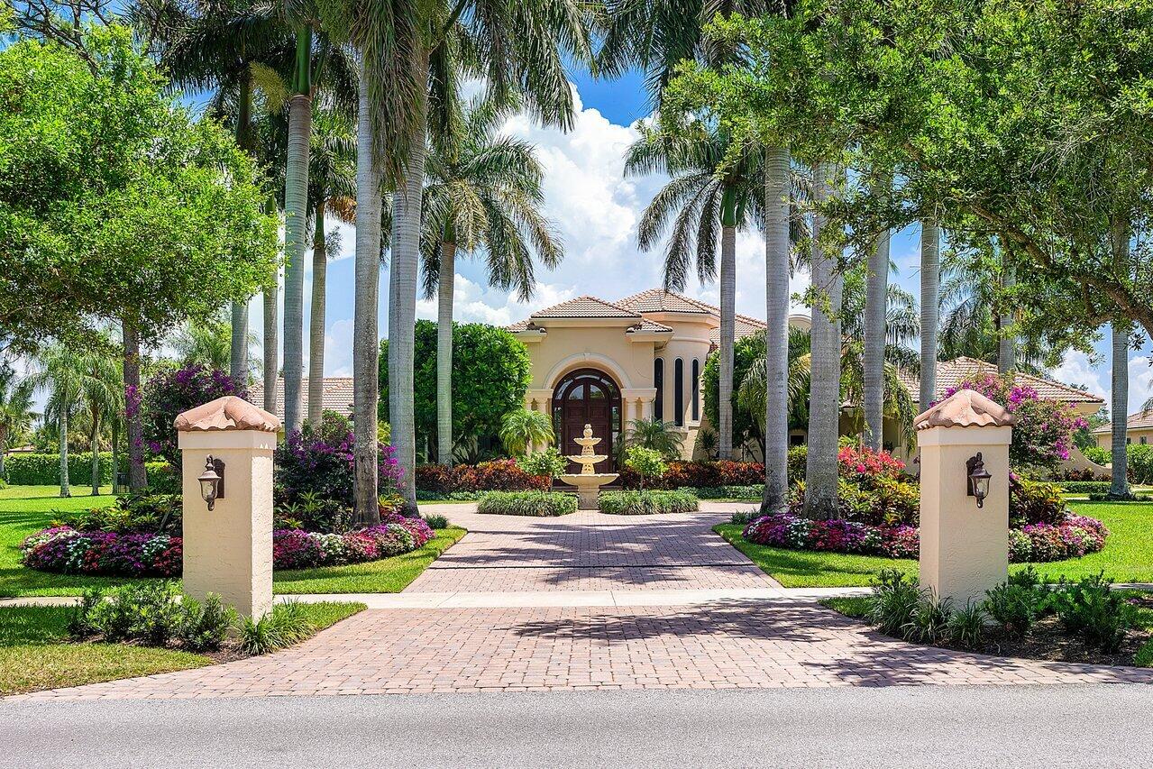 Stunning nearly 6,000 sq ft, 5 bedroom, custom home situated on 1.23 acres surrounded by canals on both sides in the exclusive, gated community of Steeplechase. Renovated gourmet kitchen featuring brand new cabinetry, marble countertops & backsplash, 6 burner Decor gas range, 2 dishwashers, double Meile ovens with a warming drawer, and a large walk in pantry. Incredibly spacious 1st story Primary Suite with two fantastic walk-in closets, bonus area, and stunning renovated luxurious bathroom. All guest suites offer ensuite renovated bathrooms and very upscale new carpeting and wall coverings. This fabulous estate also offers an elegant office overlooking the backyard and an upstairs loft perfect for extra lounging area or a gym. Exterior is perfect for entertaining with an incredible 2,000 square foot covered lanai, full summer kitchen with brand new grill and refrigerator, inviting pool & spa, and complete privacy. Other features include all new lush tropical landscaping in the front and back of this gorgeous property, new septic pump and lines, stunning custom outdoor lighting, spectacular architectural detail throughout, and much more! Call for your private tour today! (Exclusions: all drapes and lighting)