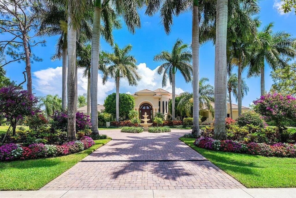 Stunning nearly 6,000 sq ft, 5 bedroom, custom home situated on 1.23 acres surrounded by canals on both sides in the exclusive, gated community of Steeplechase. Renovated gourmet kitchen featuring brand new cabinetry, marble countertops & backsplash, 6 burner Decor gas range, 2 dishwashers, double Meile ovens with a warming drawer, and a large walk in pantry. Incredibly spacious 1st story Primary Suite with two fantastic walk-in closets, bonus area, and stunning renovated luxurious bathroom. All guest suites offer ensuite renovated bathrooms and very upscale new carpeting and wall coverings. This fabulous estate also offers an elegant office overlooking the backyard and an upstairs loft perfect for extra lounging area or a gym. Exterior is perfect for entertaining with an incredible 2,000 square foot covered lanai, full summer kitchen with brand new grill and refrigerator, inviting pool & spa, and complete privacy. Other features include all new lush tropical landscaping in the front and back of this gorgeous property, new septic pump and lines, stunning custom outdoor lighting, spectacular architectural detail throughout, and much more! Call for your private tour today! (Exclusions: all drapes and lighting)