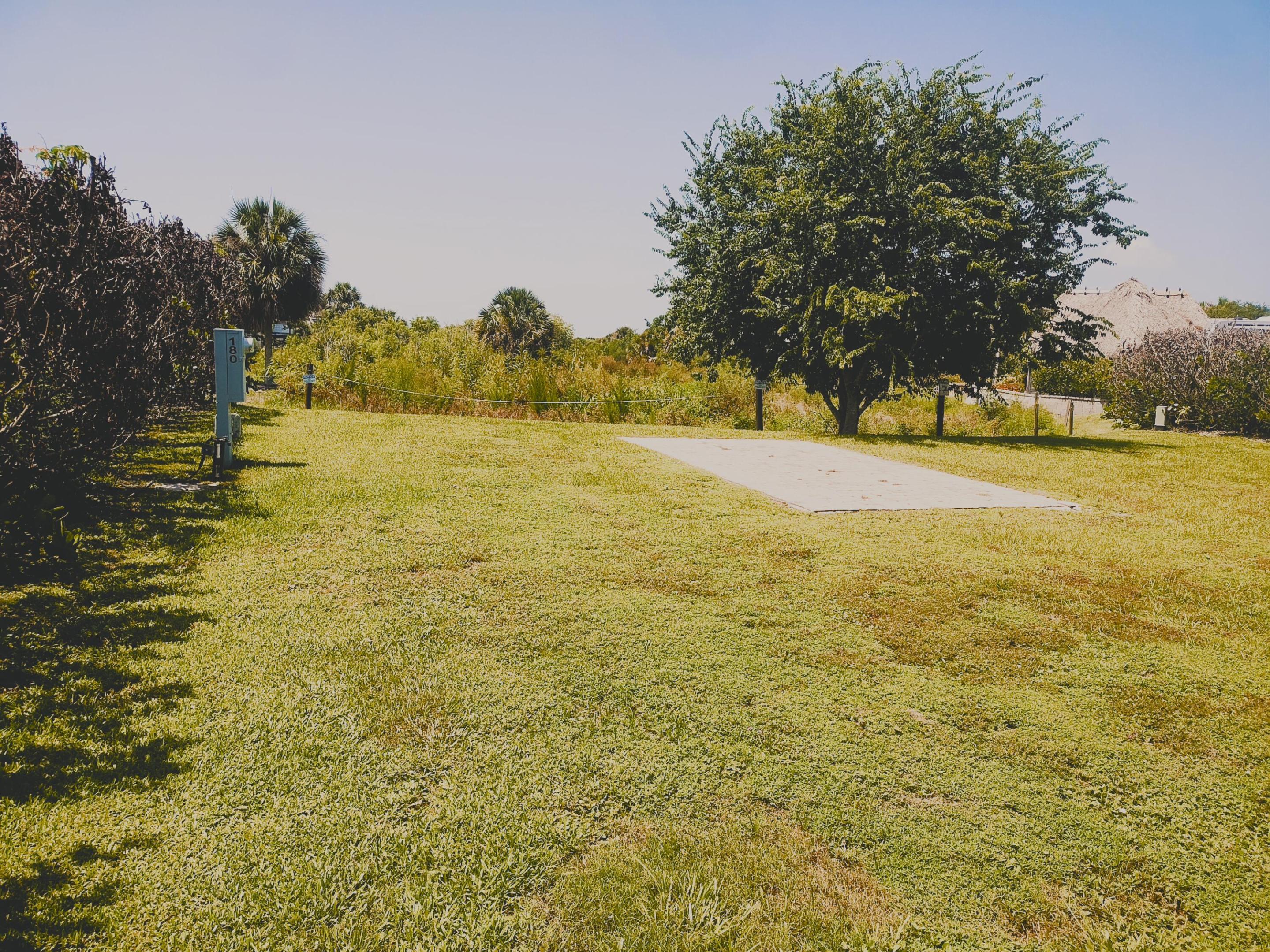 Silver Palms 5 Star RV Village. Lot 180, larger lot on the Preserve with amazing view, Nature setting, Lush landscape, on site pavers. Clubhouse, billiards, library, gym, pickle ball, shuffle board, club pool & spa, pool side bar. Convenient location to town, dining, shopping, minutes to Lake Okeechobee. Centrally located a hour East to coast, hour to Palm Beach, North to Vero.  Great opportunity, lot is ready to be tweaked to your specification.