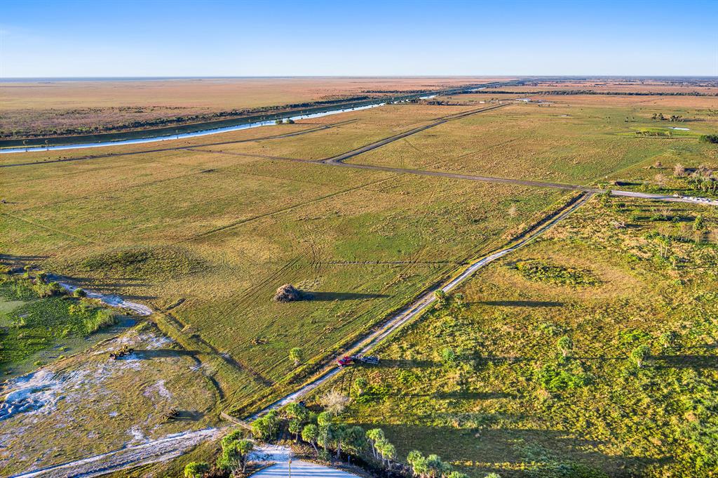 Shovel ready and fully permitted development project located on Lake Okeechobee FL. 531 acres consisting of 490 one half acre lots, 81 lots directly on the waterway which surrounds Lake Okeechobee, 75 lots on inland lakes, and includes 40 acres of commercial approved buffer along SR-78. This beautiful location is poised for development and recently attracted the new Bass Pro Resort which is being built within a few miles. Come and enjoy wide open spaces, world class outdoor lifestyle, and all that the beautiful Sunshine State has to offer! With over one thousand new residents relocating to the state per day this, development will bridge the historically low inventory gap! Welcome to Florida!