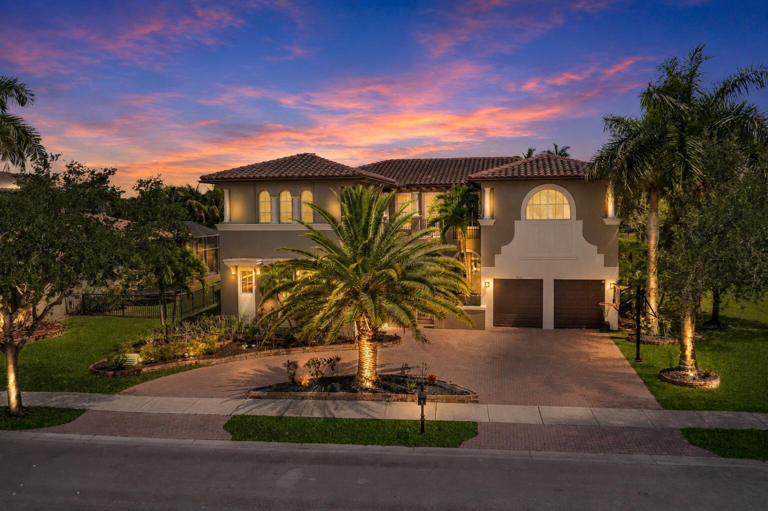 Over 5,600 SqFt Under Living! Chesapeake Model w/6 Full Beds + Theatre & Gym, 5.5 Baths Pool Home On A Waterfront Lot w/3-Car Garage . Huge Kitchen w/Granite Counters, Enormous Island, Breakfast Bar, & Stainless Steel Appliances, Double Oven. Marble Floors Downstairs, Primary Suite w/Sitting Area, Walk-In Closet w/Built-Ins, Dual Vanities & Sinks, Separate Tub & Shower. Separate Movie Theatre Room w/Wet Bar, Gym, Balcony & Full Bed Guest Suite Downstairs. Outside Area w/Covered Patio, Extended Pavers, Half Cabana Bath, Swimming Pool & Spa Overlooking Gorgeous Water Views Perfect For Entertaining. Open Floor Plan, Wet Bar, High Ceilings, & Crown Molding Throughout. 24-Hour Guard Gated Community, 2 Clubhouses, Fitness Centers, Pool & Spa, Tennis, Basketball, & More, A-Rated Schools,