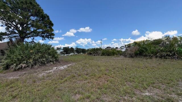 Build your dream home on this vacant lot in the desirable and growing community of Port St. Lucie. This residential parcel offers a great opportunity to secure land in a rapidly developing area. Conveniently located near shopping, dining, schools, and I95.  Enjoy the flexibility to design and build a home that fits your lifestyle.