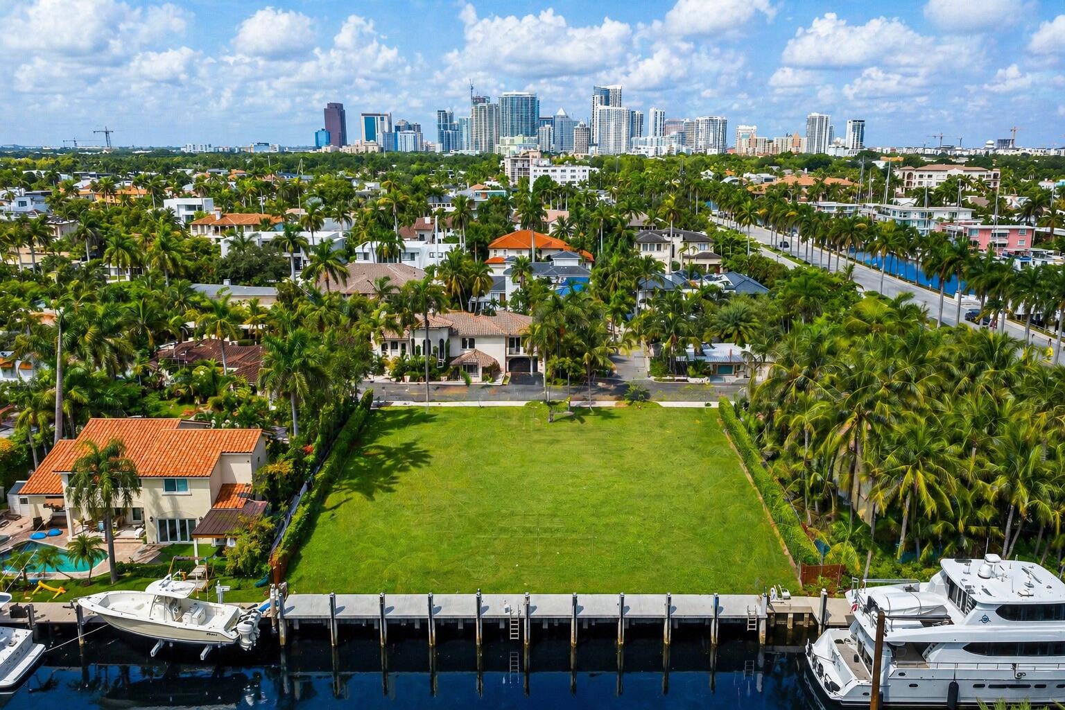Positioned on the coveted south side of Las Olas Isles, 310 Coral Way offers a rare opportunity to secure one of the few remaining 100' deepwater redevelopment sites under $4M. Surrounded by distinguished waterfront estates and ongoing luxury development, this exceptional property features no fixed bridges, faster ocean access, a brand new dock and seawall, and architectural plans in the final stages of approval with the city, potentially saving a buyer significant time and carrying costs. Buyers may proceed with the existing vision or create a fully customized waterfront estate. Just moments from Las Olas Boulevard, Ft Lauderdale Beach, fine dining, boutiques, and vibrant nightlife, 310 Coral Way combines premier location, boating lifestyle, redevelopment potential, and long-term value