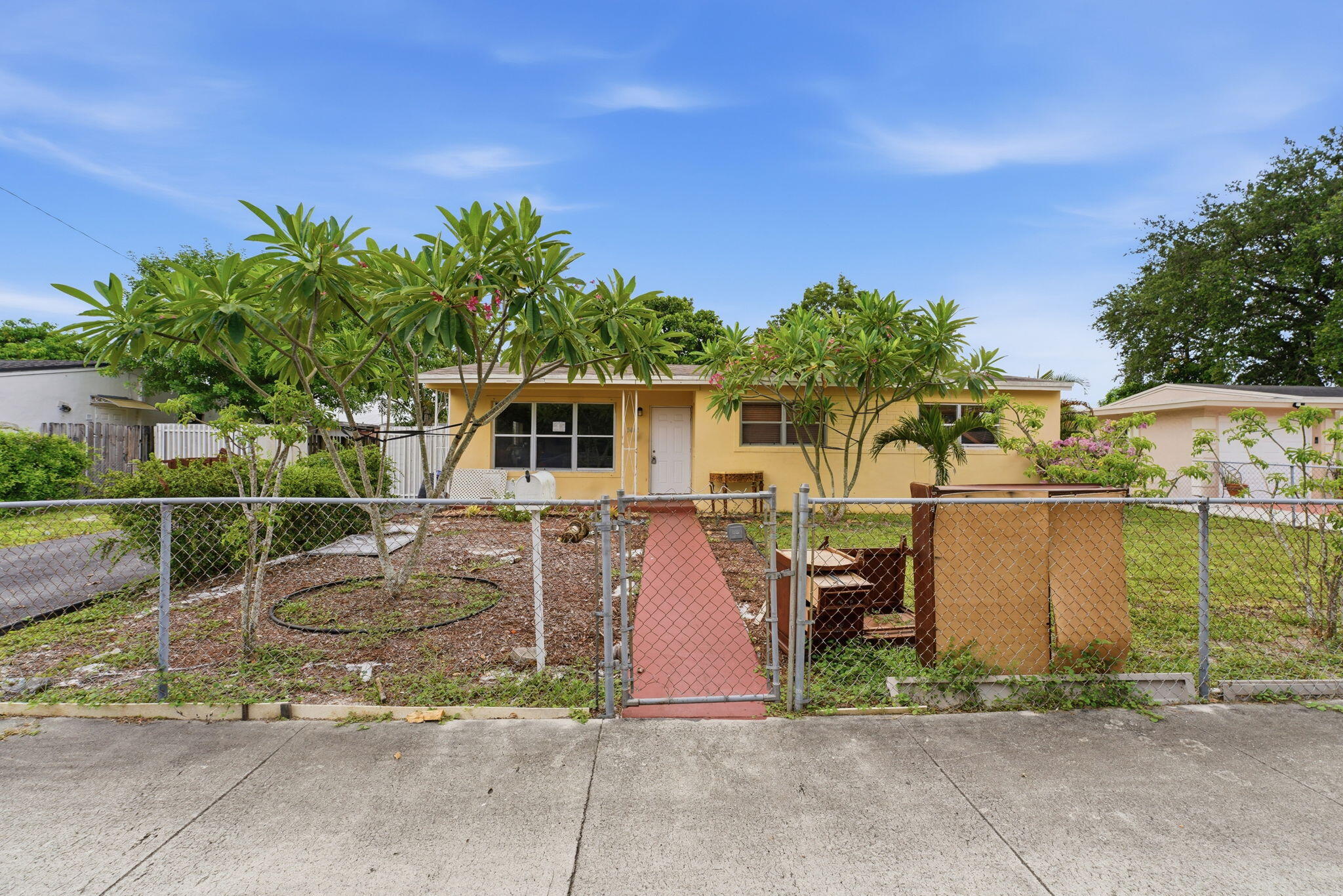 Opportunity awaits in this Miami Gardens home, offering a functional layout and plenty of potential to make it your own. While the property will benefit from some updates, it provides a great foundation for buyers looking to add their personal style and value over time. The spacious yard offers room for outdoor entertaining, gardening, or future enhancements. Conveniently located near shopping, dining, parks, schools, and major highways, this home is an excellent opportunity for homeowners and investors alike.