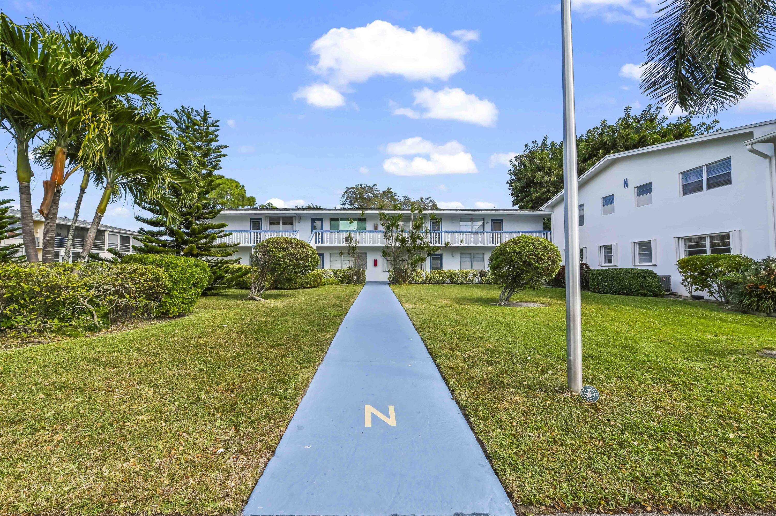 Unfurnished, move-in ready 1 bed/ 1.5 baths unit featuring private entrance & enclosed patio on the 1sr floor is now available at Durham N in Century Village, an active 55+ community in the heart of Deerfield Beach. Unit overlooks the tranquil garden area, within walking distance to the pool. Front windows & patio come complete with hurricane shutters. The spacious layout (703 sf) boasts ceiling fans & lots of closet spaces throughout. Cable & water included. 1 parking space + guest spaces. Century Village Amenities: lavish clubhouse, 1,500 seat theater, performances, shuttle buses, gym, pickleball, putting greens, tennis, indoor & outdoor pools, movies, classes & more! 24 hr security, manned entrance, cafe on property. NO ASSESSMENTS. Reach out to Listing Agent to schedule a showing toda