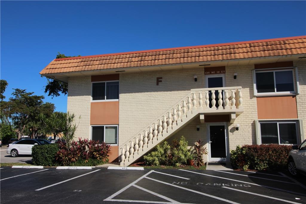 Updated 2/2, fully furnished(one TV to be excluded) , bright first floor corner unit freshly painted throughout. Nearly new, and hardly used SS Appliances, Granite counter tops, High Impact windows, and tile throughout. Large Master with Walk-in shower and large walk in closet. Newer AC, and Tankless Water Heater. This move-in ready gem is conveniently located within walking distance to the heart of Wilton Manors and the Drive. NO LAND LEASE, PETS/DOGS ALLOWED(20 lbs limit, One dog only). Low Maintenance Fees. Assigned Parking is near front door for easy access. Laundry allowed in unit. Beautiful Community Pool and Clubhouse
