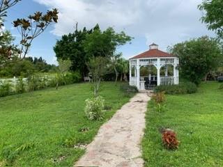 Beautiful and Large Corner House, 3Bedrooms, 2Baths plus a Den (It can be used as a room) 2 Car Garage, Quiet neighborhood. Fruit Trees at the lot, big and beautiful back yard. House can be sold with or without furniture. Must see it!! Bring your buyers!!!