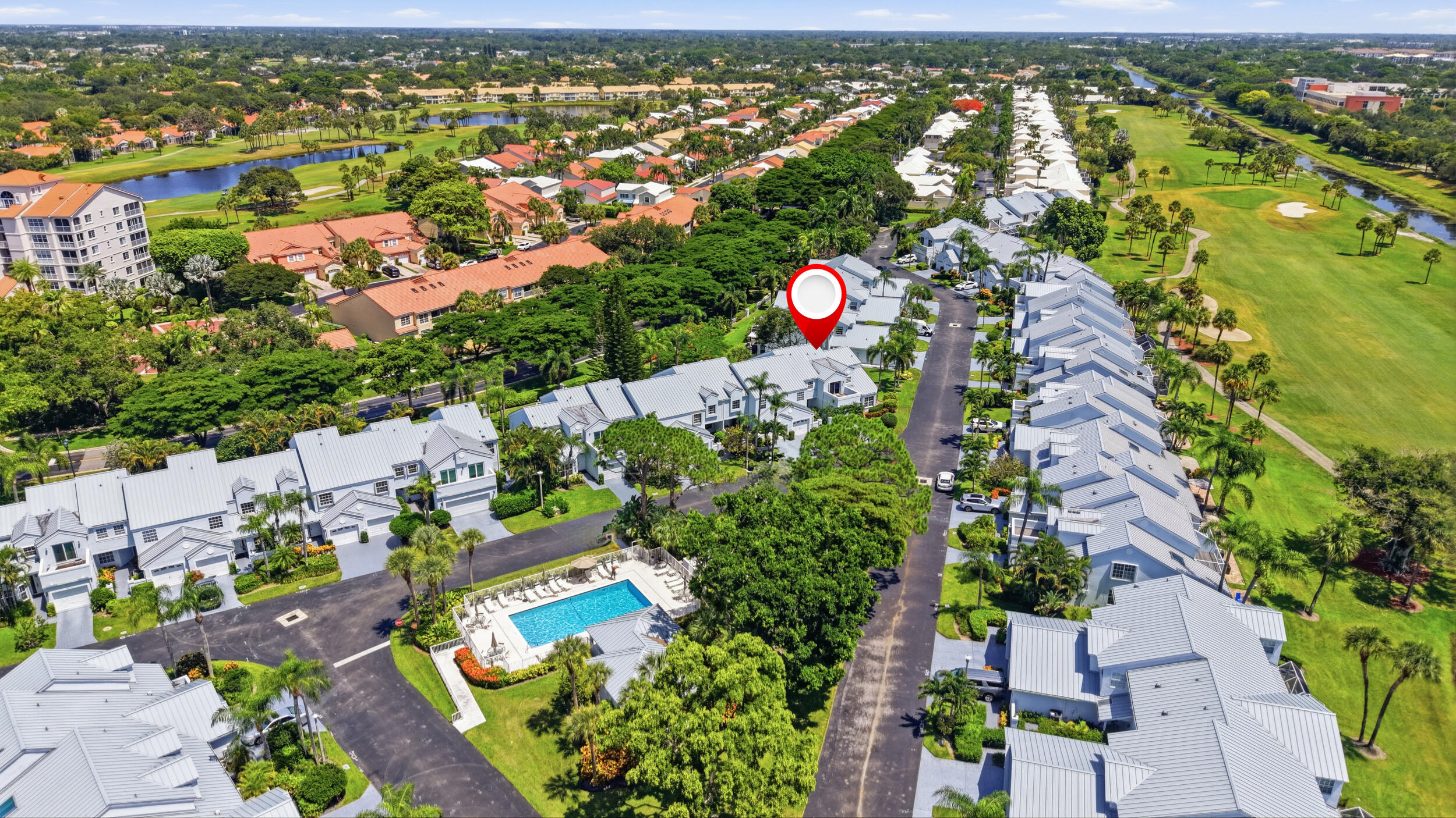 Welcome to this spacious 3-bedroom, 2.5-bath corner townhome with over 2,020 square feet of living space in the heart of Boca Raton. Features include a first-floor primary suite, upstairs loft, private balconies off both guest bedrooms, updated flooring, an upgraded kitchen with newer appliances, a new aluminum roof, storm protection shutters throughout, and a screened-in porch. Enjoy a 1-car garage, driveway parking, and the security of a gated, manned community with a pool just steps away. Community buildings have been recently painted, and the home is conveniently located near Town Center at Boca Raton, I-95, Florida's Turnpike, shopping, dining, and Boca's beautiful beaches.