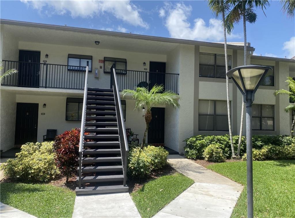 Low HOA, pet friendly w Reserves! Beautiful, gated  in very desirable Deerfield Beach. Completely renovated 1st floor unit w oversized screened patio that leads out to large grassy park like area, perfect for your fur family or kiddos. Close to shopping, dining, major highways and just a short drive to the beach. 2 large bedrooms with walk in closets and washer and dryer in the unit. Community offers a club house, pool, hot tub, fitness center, kitchen facility and BBQ area. Pet friendly, all ages, investors welcome. Commercial vehicle parking area, includes water, basic cable, roof insurance and security.  Extremely well-maintained pet friendly community. These condos are rarely available and do move quickly with Low HOA and pet friendly & great schools and parks!