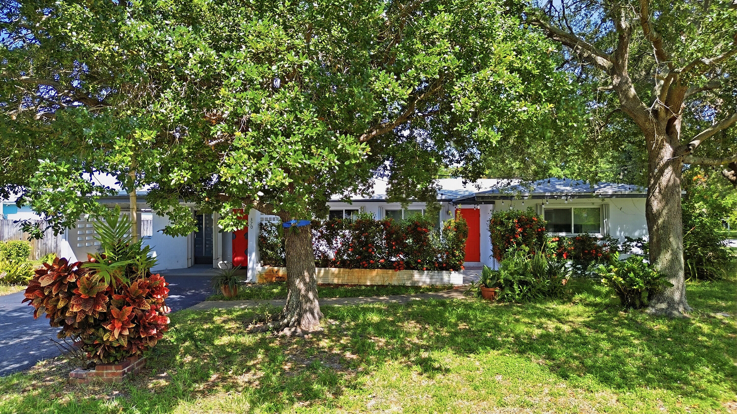 Updated 4-bedroom, 2-bath home on an oversized corner lot in Lyons Park. Features include a 2022 shingle roof, 2020 Trane A/C, hurricane impact windows, polished terrazzo floors, interior laundry room and almost 2,000 square feet under air.  Large lot provides room for a pool, boat, RV, or future expansion.   2 car carport. Great Pompano Beach location.