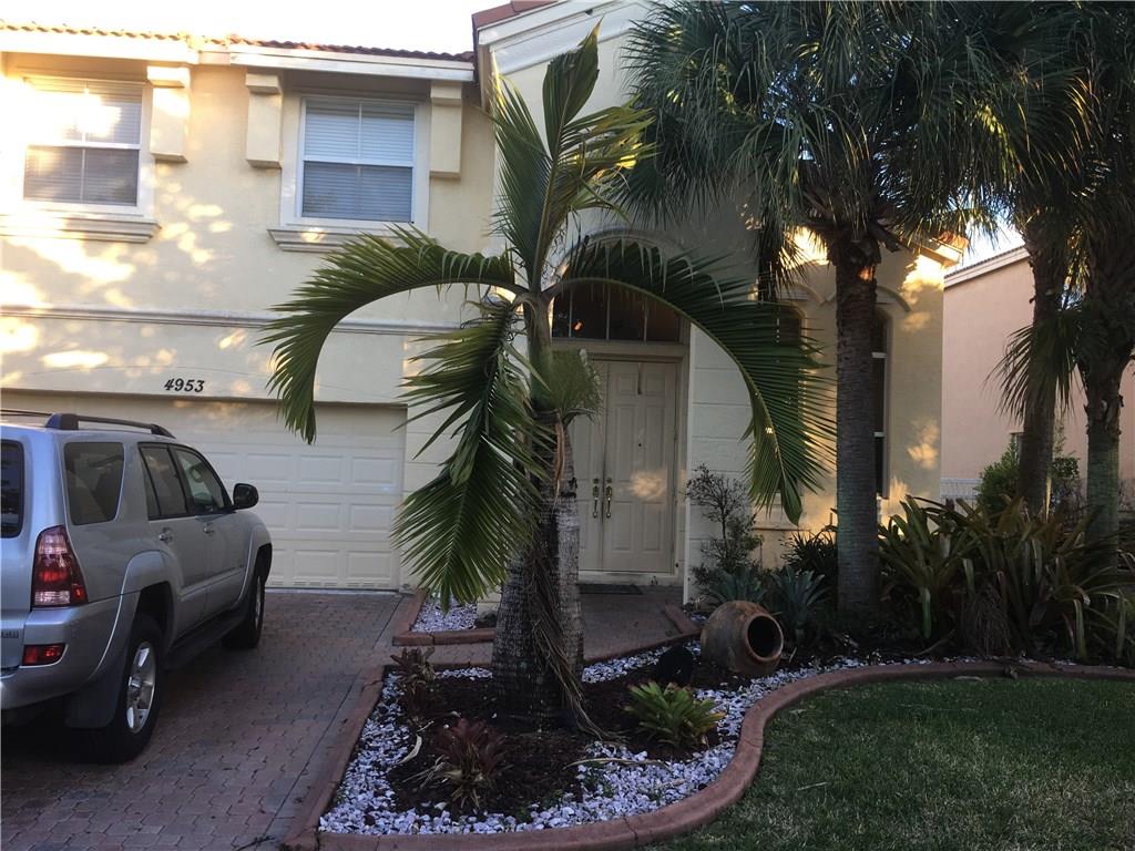 FHA VA OK lake view and over sized lot in gated community.  Open kitchen high vaulted ceilings, lower level family room, granite counter wrap around cabinetry. Tile and marble combination first floor, wood laminated upstairs. huge master bedroom walk in closet