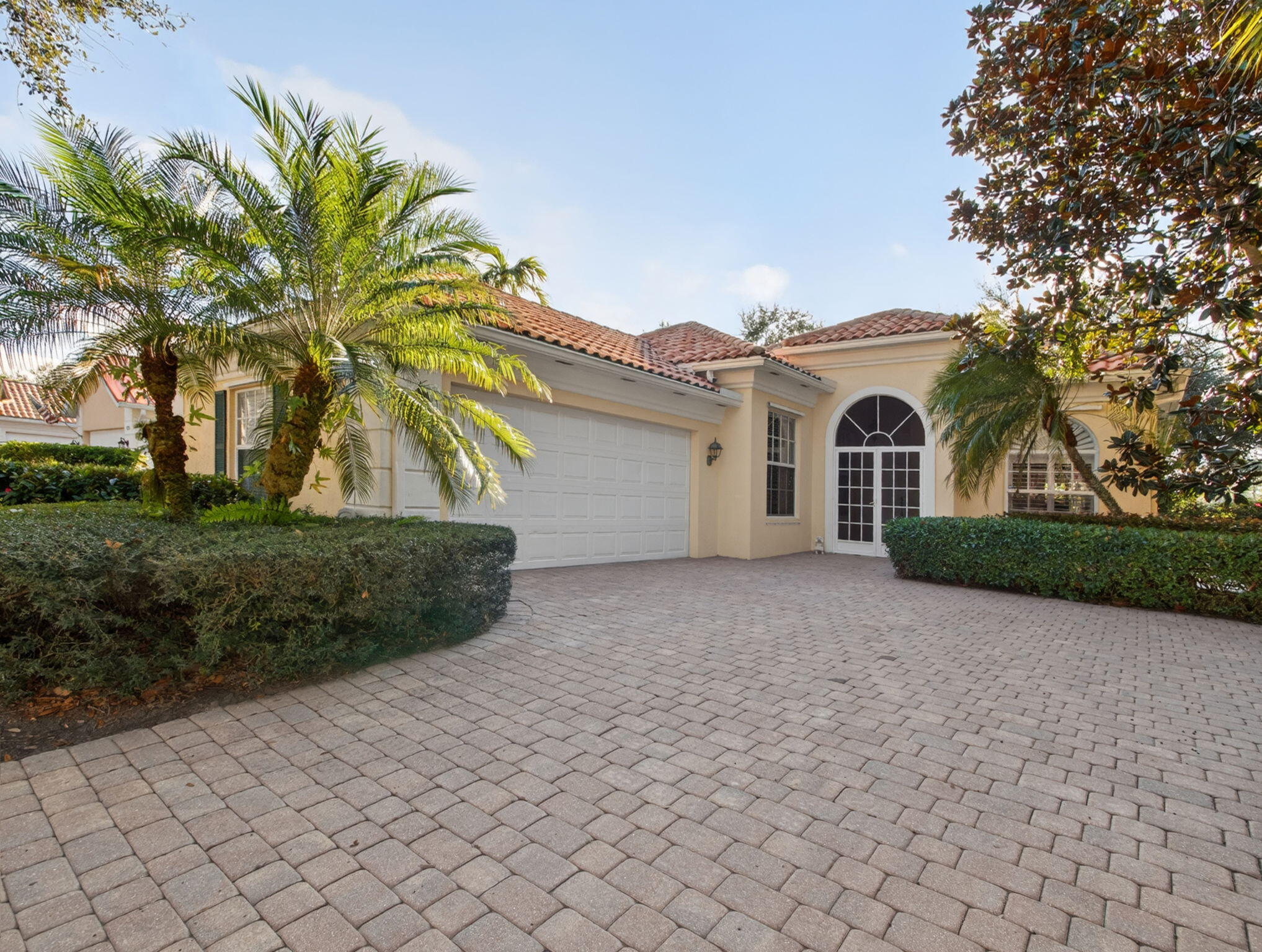 Set on a quiet cul-de-sac overlooking an 18-hole Florida style golf course, this beautifully maintained DiVosta Oakmont model offers timeless design and serene views. Soaring ceilings and an open, airy floor plan are filled with abundant natural light, creating an inviting atmosphere throughout the home.
The spacious kitchen features granite countertops, stainless steel appliances, and an easy flow to the main living areas, perfect for everyday living and entertaining. A dedicated den/office provides flexible space for work or relaxation.
The expansive primary suite is a private retreat with generous walk-in closets and his-and-hers bathrooms. Two additional guest bedrooms are comfortably sized and thoughtfully positioned. A full laundry room adds everyday convenience.
Step outside to the extended screened lanai, where tranquil, private golf views create the perfect backdrop for morning coffee or evening unwinding.
Located in The Florida Club, residents enjoy a community pool, tennis and pickleball courts, fitness room, and a pay-as-you-play golf course complete with clubhouse, pro shop, and restaurant. Conveniently close to dining, shopping, and major highways for easy commuting, this home blends comfort, lifestyle, and location beautifully.