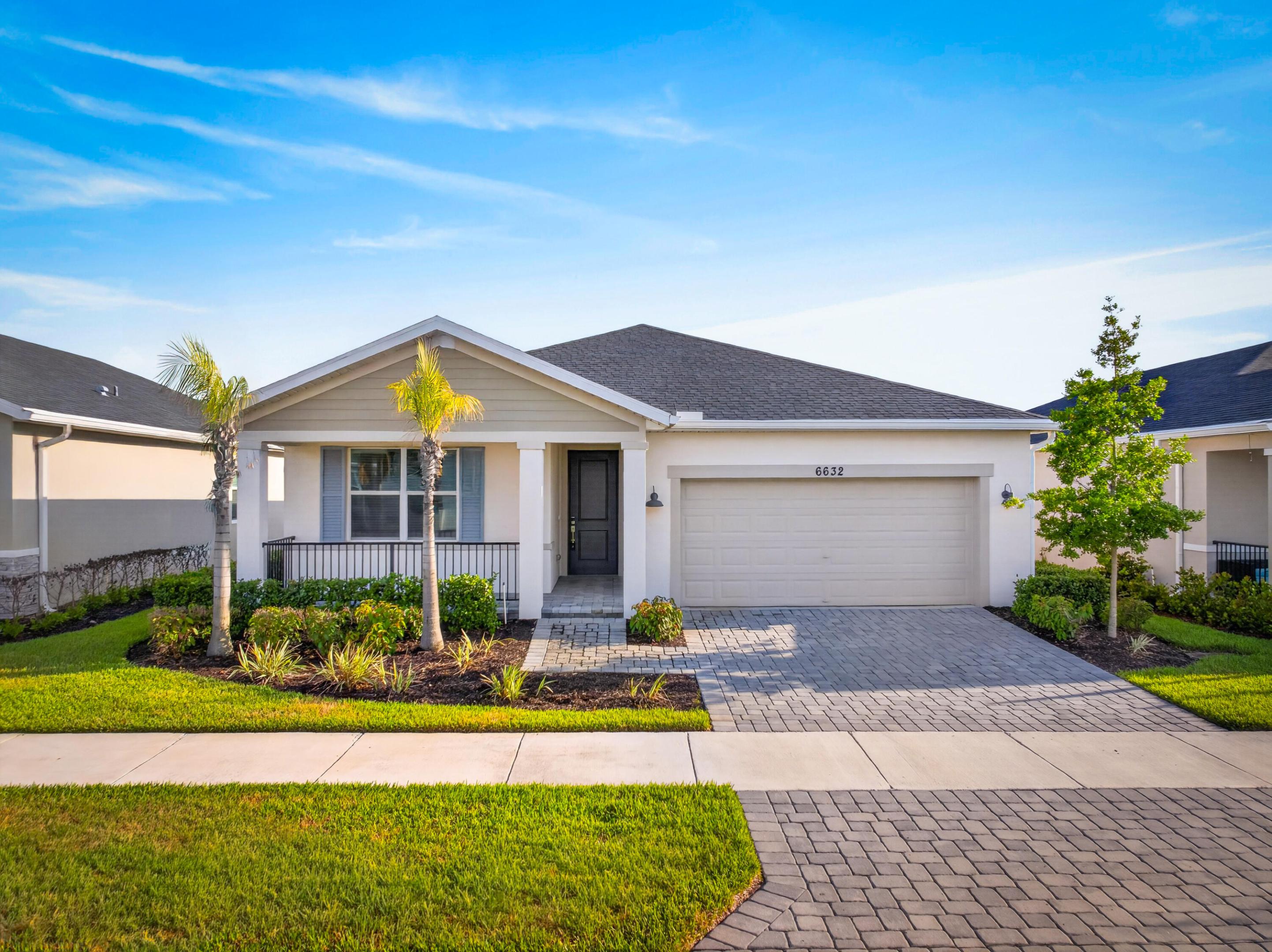 Built in 2024, this beautifully designed CBS construction home offers 4 bedrooms, 3 full bathrooms, a 2-car garage, and over 2,000 sq ft under air in the desirable Brystol at Wylder community. Features include hurricane impact windows, an open-concept layout, luxury wood-look flooring, a spacious kitchen island with white shaker cabinetry, stainless steel appliances, recessed lighting, and a covered lanai. The split-bedroom floor plan provides flexibility for entertaining guests, or a home office. Residents enjoy resort-style amenities including a clubhouse, pool, fitness center, pickleball courts, playground, dog park, scenic lakes, and walking trails. Conveniently located near I-95, shopping, dining, golf, and Treasure Coast beaches. Move-in ready and better than new!