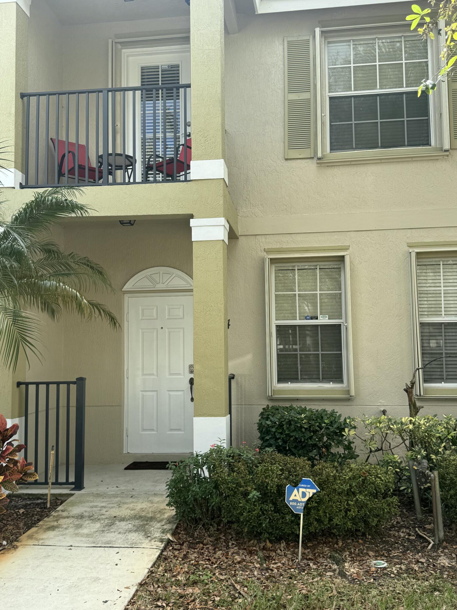 Discover this immaculate 3-bedroom, 2.5-bath, 1-car garage end-unit townhome in the highly desirable East Lake Village community, just steps from the sparkling heated pool. Featuring a bright eat-in kitchen, an exceptionally spacious main living area, a generous master suite with walk-in closet, and accordion shutters throughout, this move-in-ready gem also boasts recent updates including a 2017 A/C, 2021 water heater, 2021 garbage disposal, 2021 gutters, and fresh interior paint from 2019. Nestled in a vibrant, family-friendly neighborhood with sidewalks, a playground, and amenities for all ages, the home enjoys a prime location minutes from the Civic Center, hospital, shopping, and just 10 minutes to beautiful Jensen Beach and downtown Stuart—offering the perfect blend of convenience comfort, and coastal lifestyle. Don't miss this meticulously maintained, turnkey opportunity! Seller offering $5,000.00 towards buyer closing costs.
