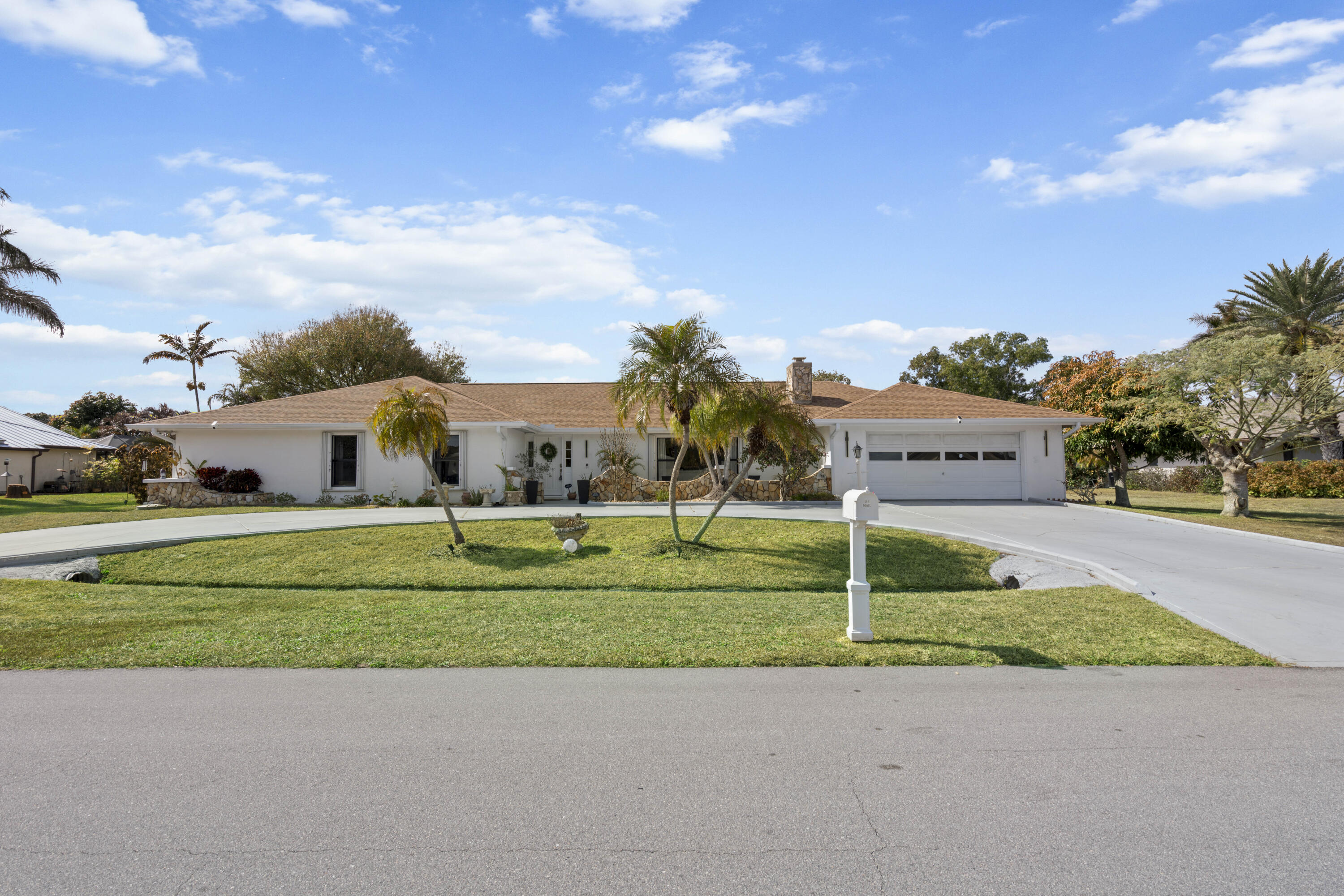 Welcome to this spacious 3-bedroom, 2-bath home in the desirable Sandpiper Bay area of Port St. Lucie, perfectly situated on beautiful Calvin Street. One of the larger homes in the community, this property offers room to spread out both inside and out with no HOA and plenty of space for all your toys. A brand-new 2025 roof provides peace of mind, while the oversized 2-car garage and large backyard add everyday functionality and outdoor potential. Inside, the home features a generous and flexible floor plan, including a large bonus room currently used as an office that could easily serve as a 4th bedroom, media room, or mother-in-law suite. The expansive Florida room spans the full width of the home, creating an incredible bonus living space perfect for entertaining, relaxing, or hosting gatherings. The kitchen is equipped with new appliances, and the home also includes accordion shutters for added storm protection. A cozy wood-burning fireplace adds charm and character, creating a warm and inviting focal point. Connected to city water and sewer, this well-located home combines size, flexibility, and major updates in one of Port St. Lucie's most established neighborhoods. Come see all the space and possibilities this Sandpiper Bay gem has to offer!