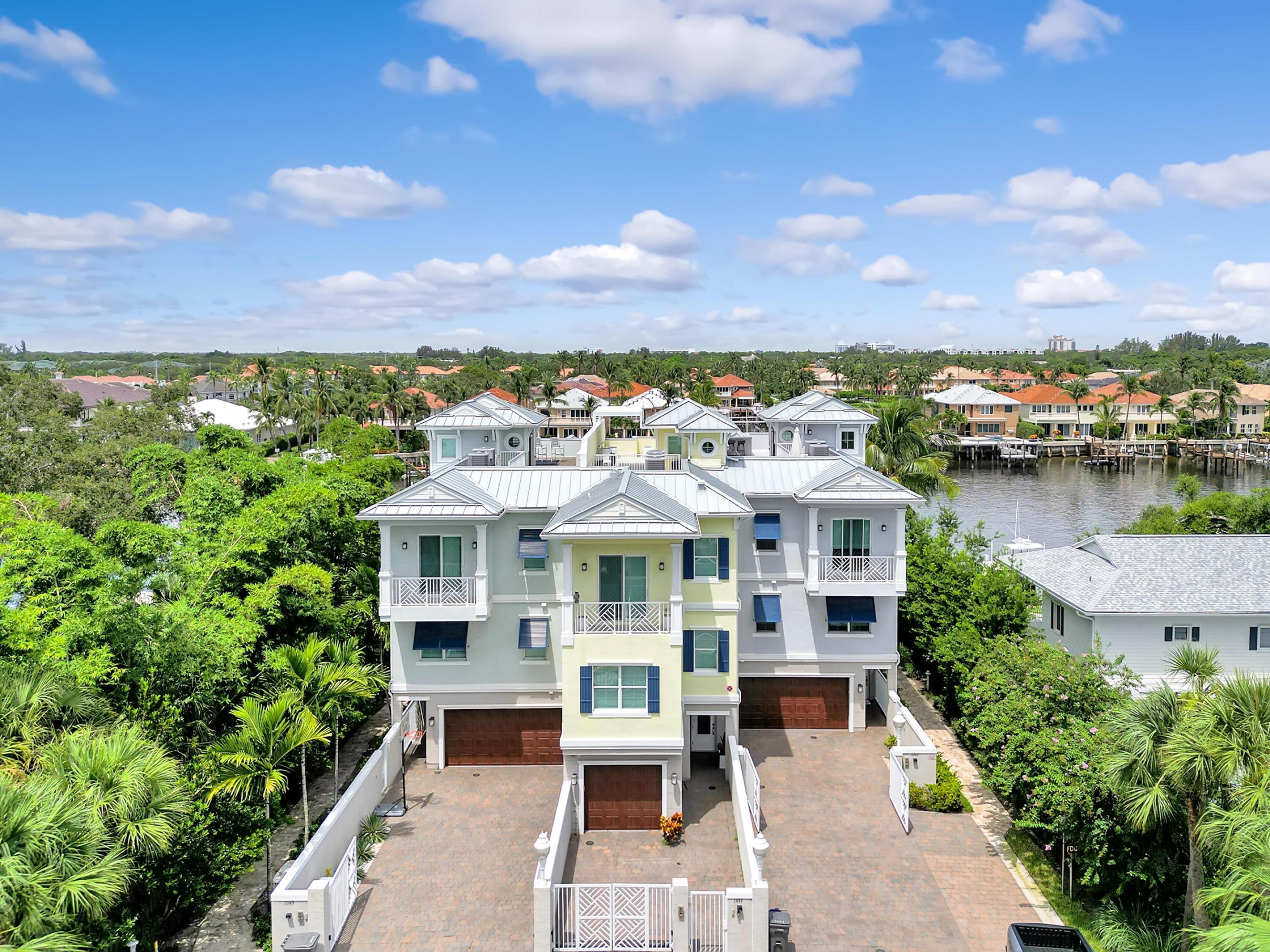 Discover luxury living in North Palm Beach. This 4-story waterfront condo sits directly on the Intracoastal with no fixed bridges and minutes to the ocean, offering breathtaking horizon views. Designed for lifestyle and comfort, it features soaring ceilings, an open layout, and high-end finishes throughout. The gourmet kitchen includes top-tier appliances, quartz countertops, and a pearl backsplash. The primary suite offers a walk-in closet, spa-like bath, and private balcony overlooking the water. Boaters will love the private dock with a 25,000 lb lift, accommodating up to a 35-ft boat for effortless access to open water. Exceptional location, unmatched views, and true coastal elegance.