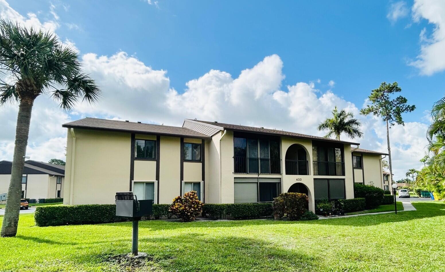Nicely updated 2 bedroom 2 full bath 2nd floor condo. Perfectly located with a serene back drop of foliage and steps away from a picnic/BBQ area. The property has been updated with Hurricane/Impact windows, GFCI outlets & USB charging outlet. Both bathrooms feature full tiled walls, walk in showers with frameless barn door style glass doors, overhead rain shower head as well as 2nd shower head, wand & grab bars. Master suite offers ensuite bathroom and walk in closet with attic access. Utility closet allows for full sized W/D, food pantry and storage. Ceiling fans throughout and LED lighting. The community is an active 55+ with clubhouse, heated pool, tennis/pickleball.