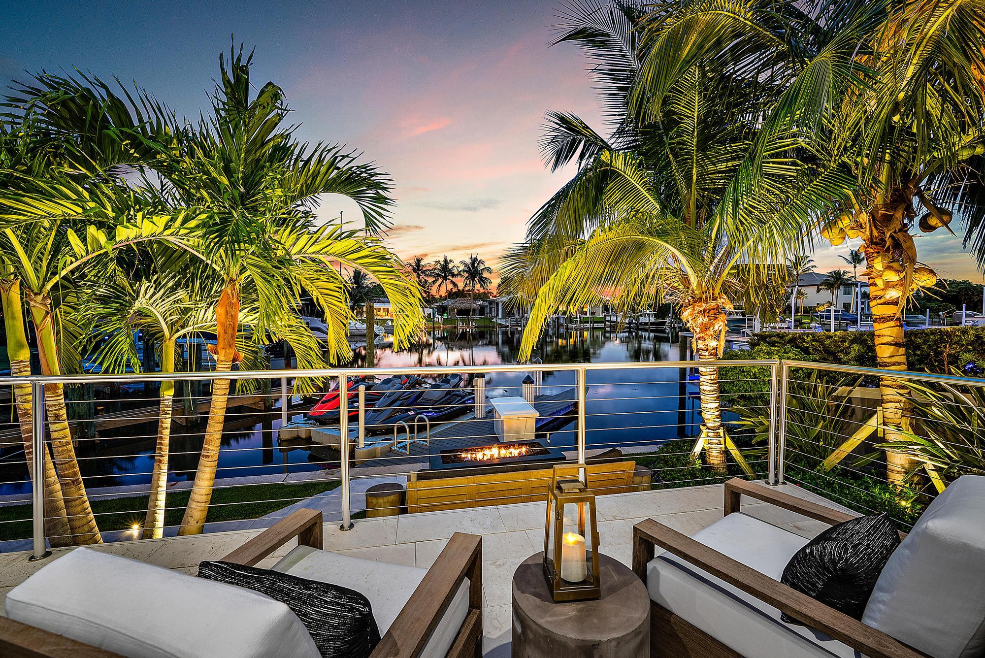 Completed in the latter part of 2021, this magnificent single-story tropical waterfront sanctuary combines chic contemporary design, soaring ceilings, and an impressive open floor plan. No detail has been left to chance, as the residence showcases impeccable craftsmanship, premium materials and exquisite designer finishes throughout.

The expansive, state-of-the-art chef's kitchen is equipped with high-end Thermador appliances, including a gas cooktop, dual dishwashers, double ovens, two beverage drawers, a spacious pantry, and an abundance of storage space. Equipped with a Savant smart home system, luxurious lighting fixtures and chandeliers, inviting fireplaces, custom drapes, motorized blinds, California closets throughout, a well-appointed wet bar and an elegant formal dining room complete with wine walls and storage. Adding to the feeling of opulence are Armani silk wall coverings gracing the family room and living room. In addition, the property boasts a comprehensive whole-house scenting system, a sophisticated security camera setup, an integrated sound system throughout and a 3-car garage with built-in storage, slat walls, and epoxy flooring.

All major living spaces seamlessly connect to an exquisite private backyard oasis featuring a large covered loggia with phantom screens, a heated saltwater pool and spa, an outdoor kitchen for summer delights, a refreshing outdoor shower, multiple inviting sitting areas, lush tropical landscaping, gorgeous sunsets and artfully designed lighting to enhance the ambiance.

The dock is outfitted with full-electric and will accommodate up to a  35-foot vessel. Nestled along a wide canal without obstructions, it provides swift passage to the Intracoastal waterway, Peanut Island, the Palm Beach Inlet, and the Atlantic Ocean - a boater's dream.

Conveniently located in the Village of North Palm Beach only minutes from shopping, fine dining, North Palm Beach Country Club, major highways, Palm Beach International airport and some of the area's best beaches. 

DISCLAIMER: Information published or otherwise provided by the listing company and its representatives including but not limited to prices, measurements, square footages, lot sizes, calculations, statistics, and videos are deemed reliable but are not guaranteed and are subject to errors, omissions or changes without notice. All such information should be independently verified by any prospective purchaser or seller. Parties should perform their own due diligence to verify such information prior to a sale or listing. Listing company expressly disclaims any warranty or representation regarding such information. Prices published are either list price, sold price, and/or last asking price. The listing company participates in the Multiple Listing Service and IDX. The properties published as listed and sold are not necessarily exclusive to listing company and may be listed or have sold with other members of the Multiple Listing Service. Transactions where listing company represented both buyers and sellers are calculated as two sales. Cooperating brokers are advised that in the event of a Buyer default, no financial fee will be paid to a cooperating Broker on the Deposits retained by the Seller. No financial fee will be paid to any cooperating broker until title passes or upon actual commencement of a lease. Some affiliations may not be applicable to certain geographic areas. If your property is currently listed with another broker, please disregard any solicitation for services. Copyright 2024 by the listing company. All Rights Reserved.