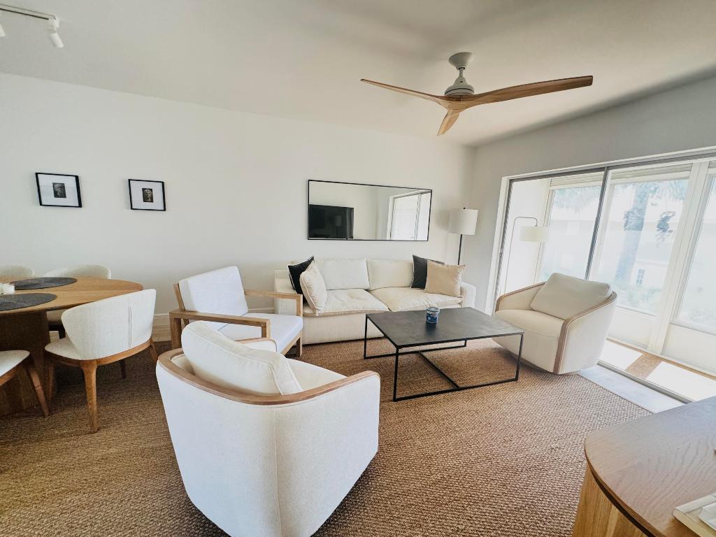 Your new address on the beach! Bring your suitcase and relax! Bright, modern, and beautifully remodeled 2/2  corner condo with ocean views from both porches. Features include impact windows, brand-new finishes throughout, and your own washer and dryer in the unit. Step outside and enjoy 200 feet of private beach right out front the perfect place to soak up the sun and unwind. Walk to restaurants and shops, ideally located between Delray Beach and Palm Beach, it doesn't get better than this!