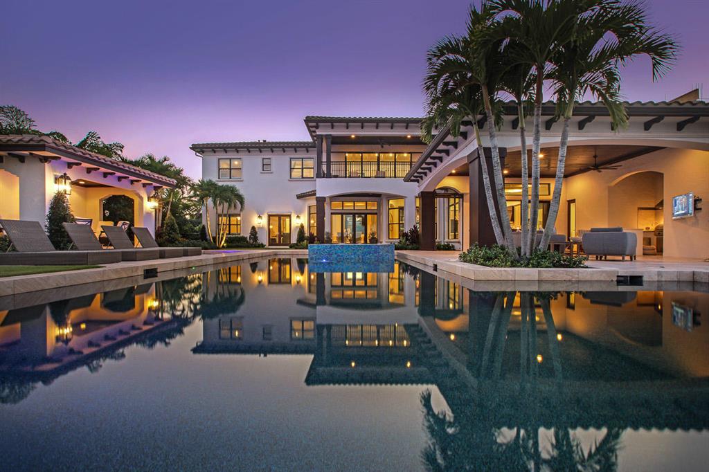 This impeccable 7 bed/7 bath riverfront estate is a sanctuary of relaxation. Newly remodeled by Turtle Beach Construction, this home boasts luxury and craftsmanship with an open-floor plan, high-end finishes, and European White Oak flooring throughout. With 105 feet of uninterrupted waterfrontage, it has some of the most captivating views south Florida has to offer. This home features a gourmet chef's kitchen complete with marble counter-tops, Downsview cabinetry, 2 large islands, and a La Cornue gas stove, home theater, and a 2 bed/2 bath guest house. Additional features include Crestron lighting systems, wine cellar, elevator, air conditioned 8-car garage, gas fireplace, whole house generator, water filtration system, and a large master suite with a new custom bathroom and steam shower. The backyard is an entertainer's dream featuring a new custom pool & spa, cabana, fire pit, lush landscaping, and a large covered lanai with an outdoor kitchen. No matter the time of day, the custom lighting and outdoor surround sound system make this backyard the perfect outdoor escape. Boating/fishing is made easy with the properties' deeded dock and two boat-lifts. Conveniently located just minutes to the Jupiter Inlet and all of the best restaurants, beaches, and shopping Jupiter has to offer!
