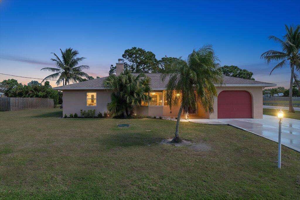 Lakefront Corner-Lot Gem on 1/3 Acre — No HOA! Welcome home to this charming 2-bedroom, 2-bath, 1,547 sq ft single-family residence perfectly positioned on a corner lot with tranquil lake views in a quiet residential neighborhood — all with NO HOA. Set on an expansive 1/3-acre lot, this property offers rare space, privacy, and endless potential for outdoor living, entertaining, or future enhancements. Enjoy peaceful mornings overlooking the lake and beautiful sunsets from your own backyard oasis. Inside, you'll find a bright and functional layout with generous living areas, well-sized bedrooms, and plenty of natural light throughout. Whether you're looking for a primary residence, vacation home, or investment opportunity, this home checks all the boxes. Located just minutes from pristine beaches, popular restaurants, and everyday shopping, you'll love the convenience of coastal living while still enjoying the comfort of a residential setting.   Lakefront living  Corner property on 1/3 acre   No HOA restrictions   Close to beaches, dining & retail Don't miss this opportunity to own a slice of Florida paradise   schedule your private showing today!