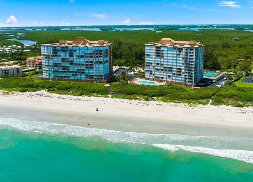 Welcome to Oceanique Condo, a hidden gem nestled in the heart of North Hutchinson Island, within the picturesque St. Lucie County. This beachfront paradise offers an unparalleled lifestyle characterized by stunning ocean views, luxurious amenities, and a vibrant community atmosphere, that includes a community pool, hot tub, fitness center, pickleball, tennis, billiards and much more! This beautifully maintained fully furnished condo located on the 7th floor, featuring, three bedrooms and a den, (plus your own 1 car private garage) is ideal for full-time living or as your perfect winter getaway!